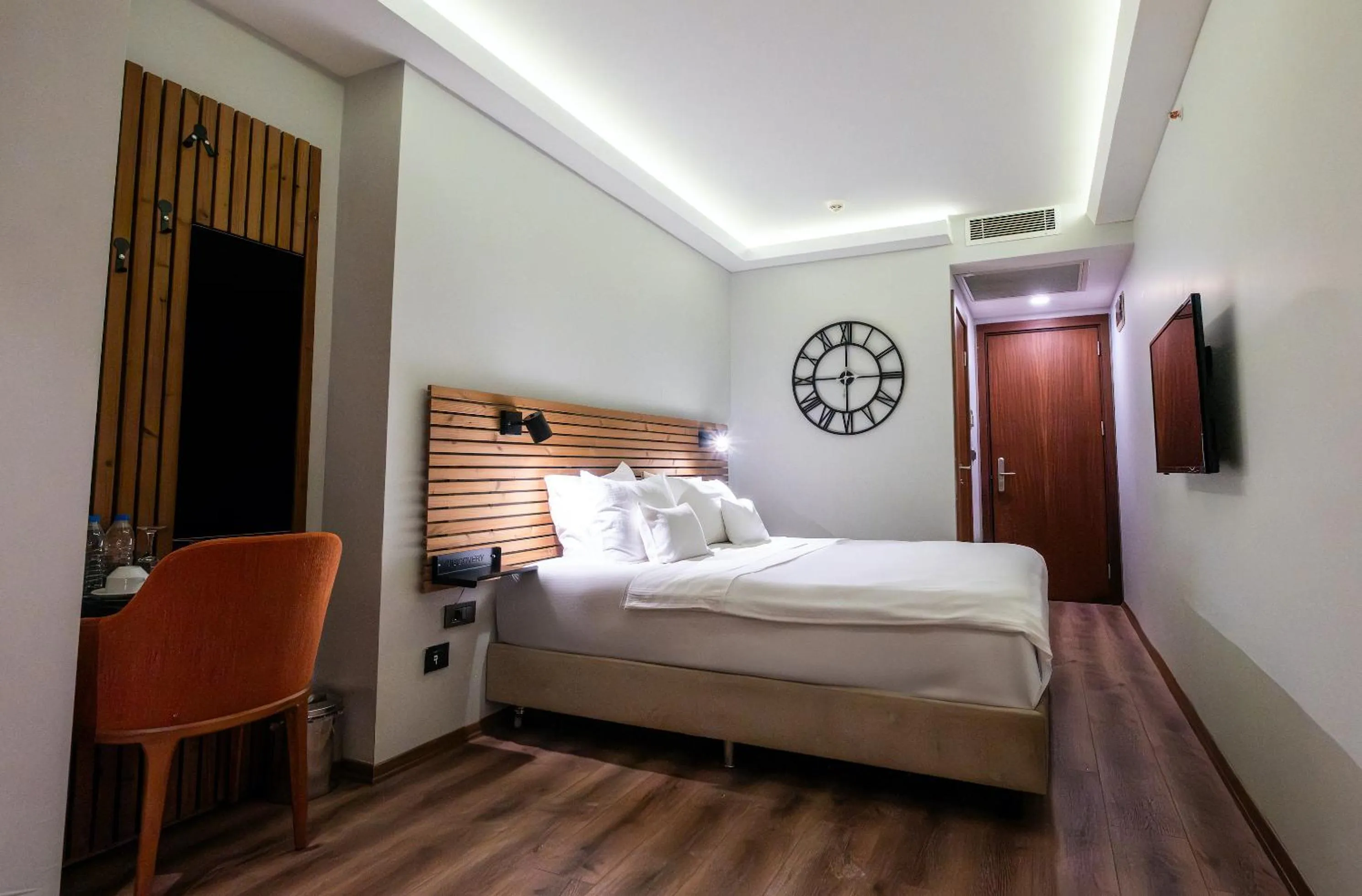 Bed in Discovery Hotel