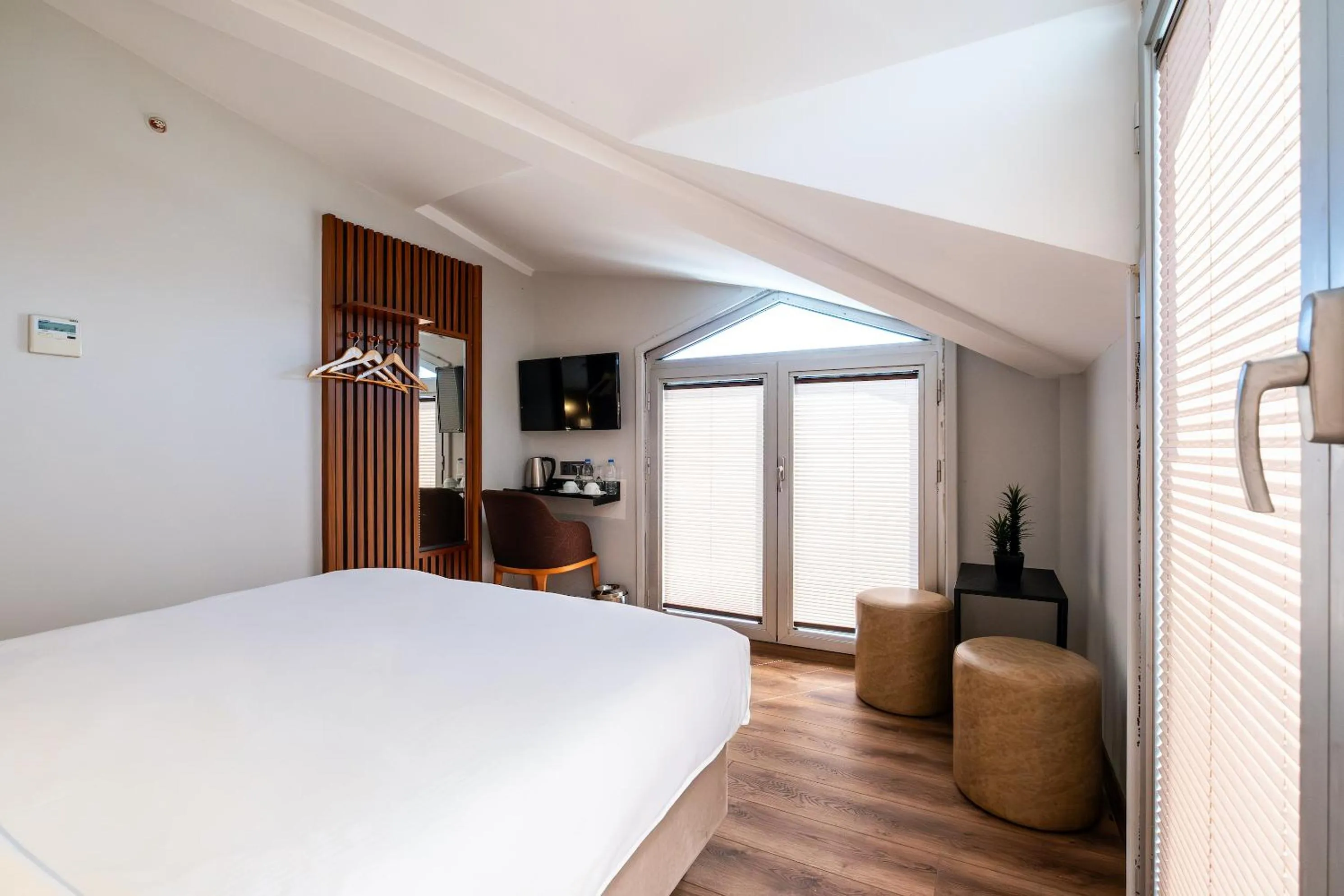 Bed in Discovery Hotel