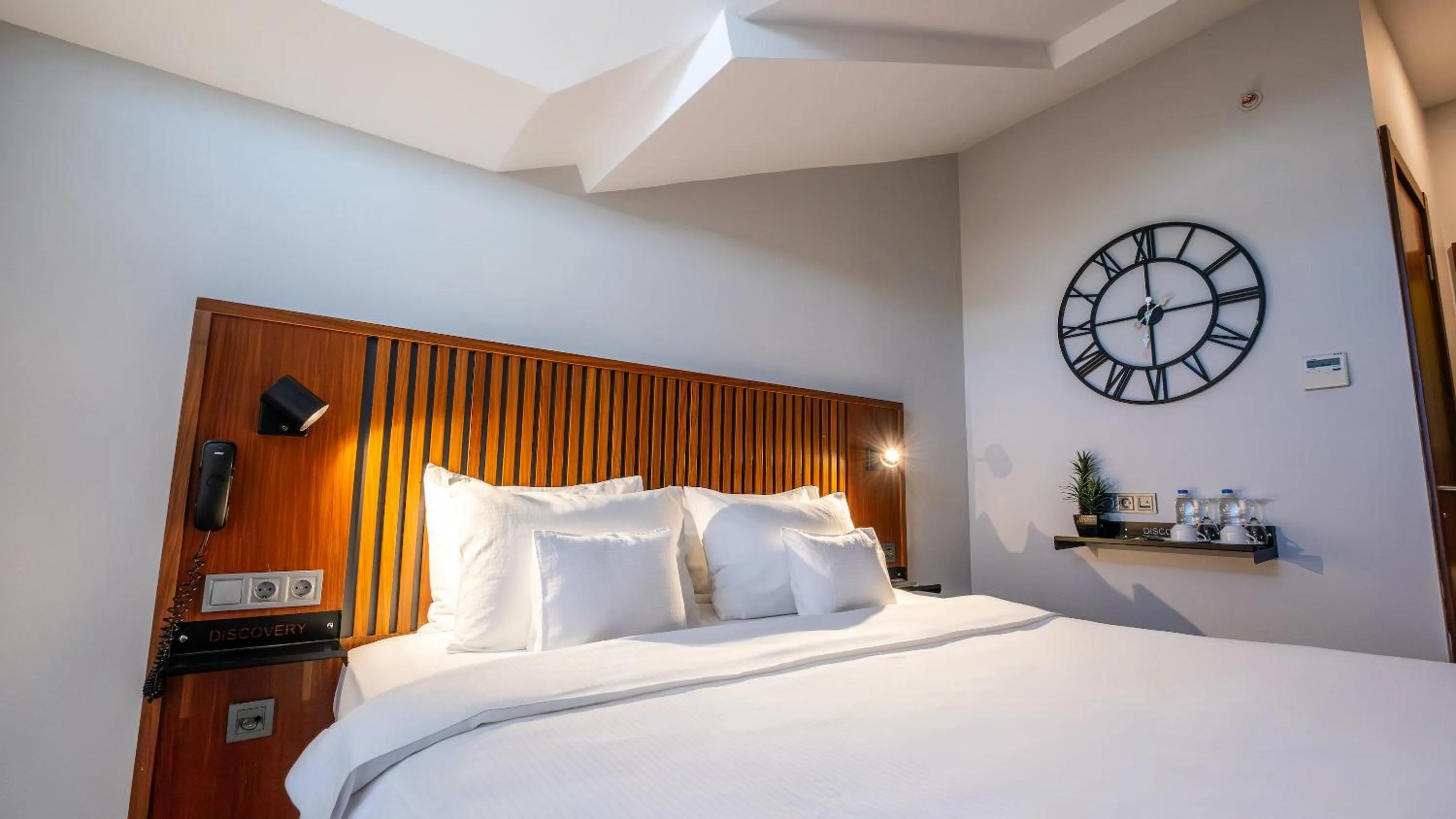 Bed in Discovery Hotel