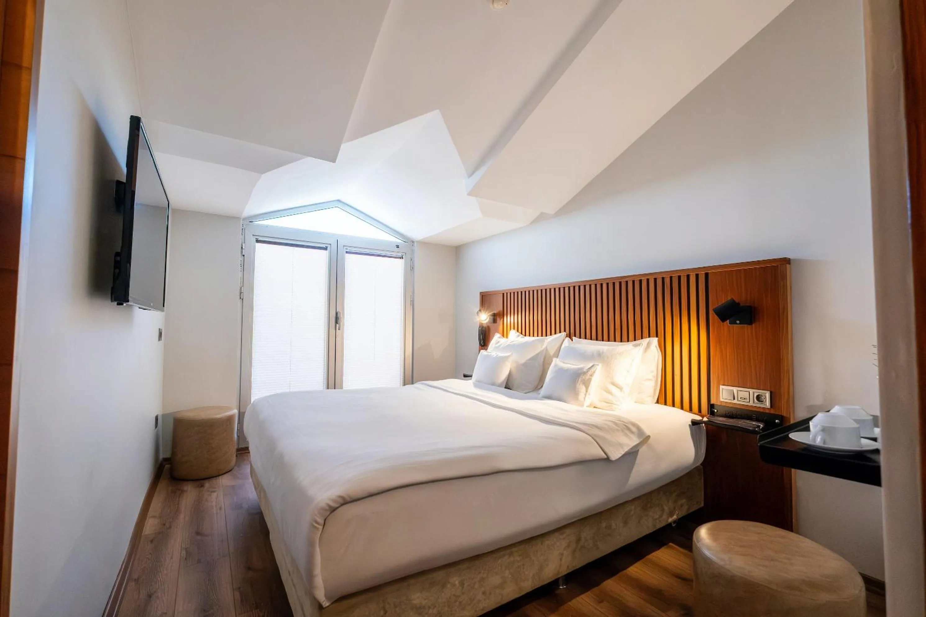 Bed in Discovery Hotel