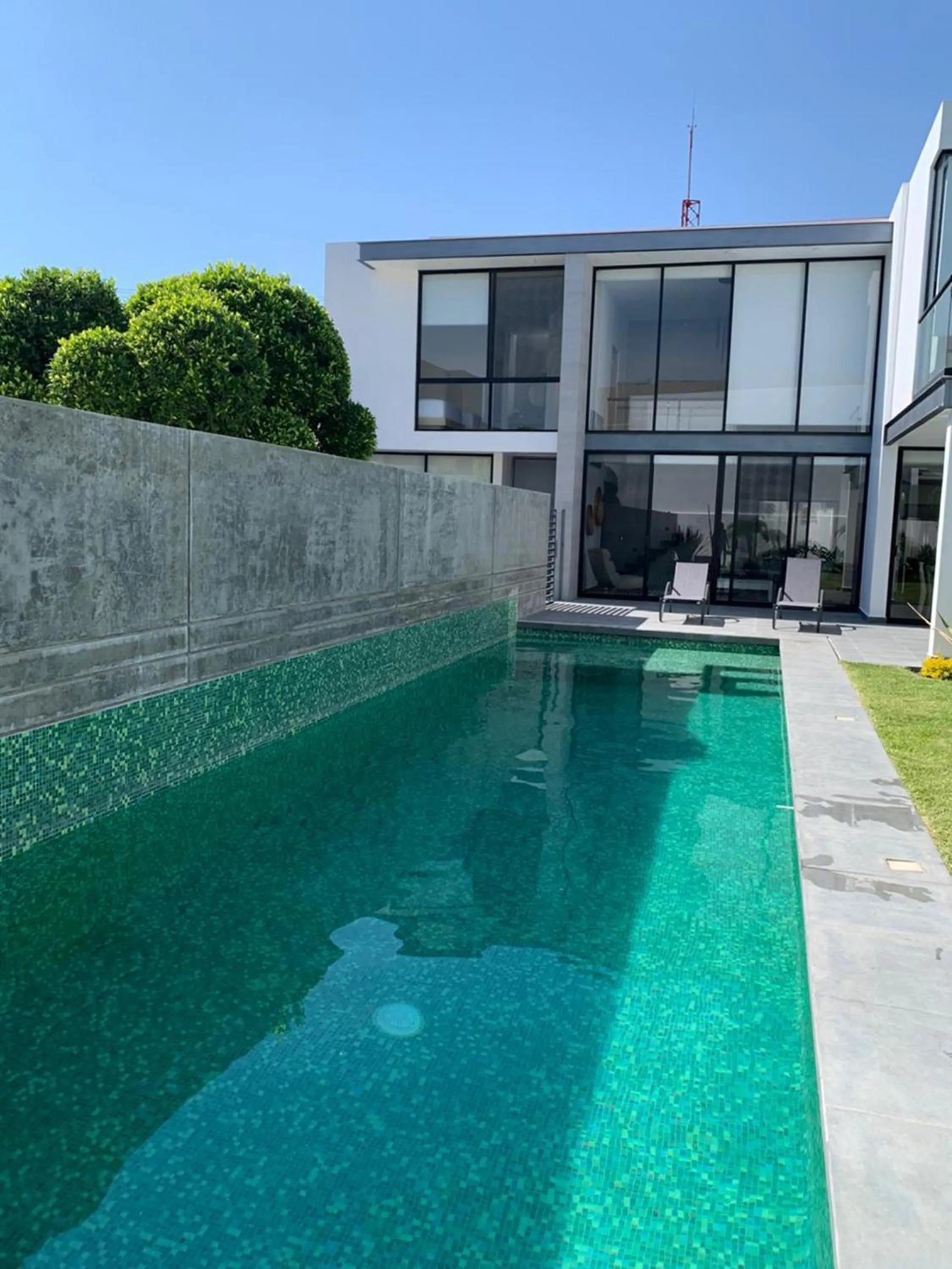 Swimming pool in Casa Begonias Hotel mas Villas