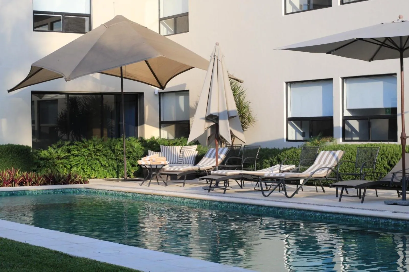 Swimming pool in Casa Begonias Hotel mas Villas