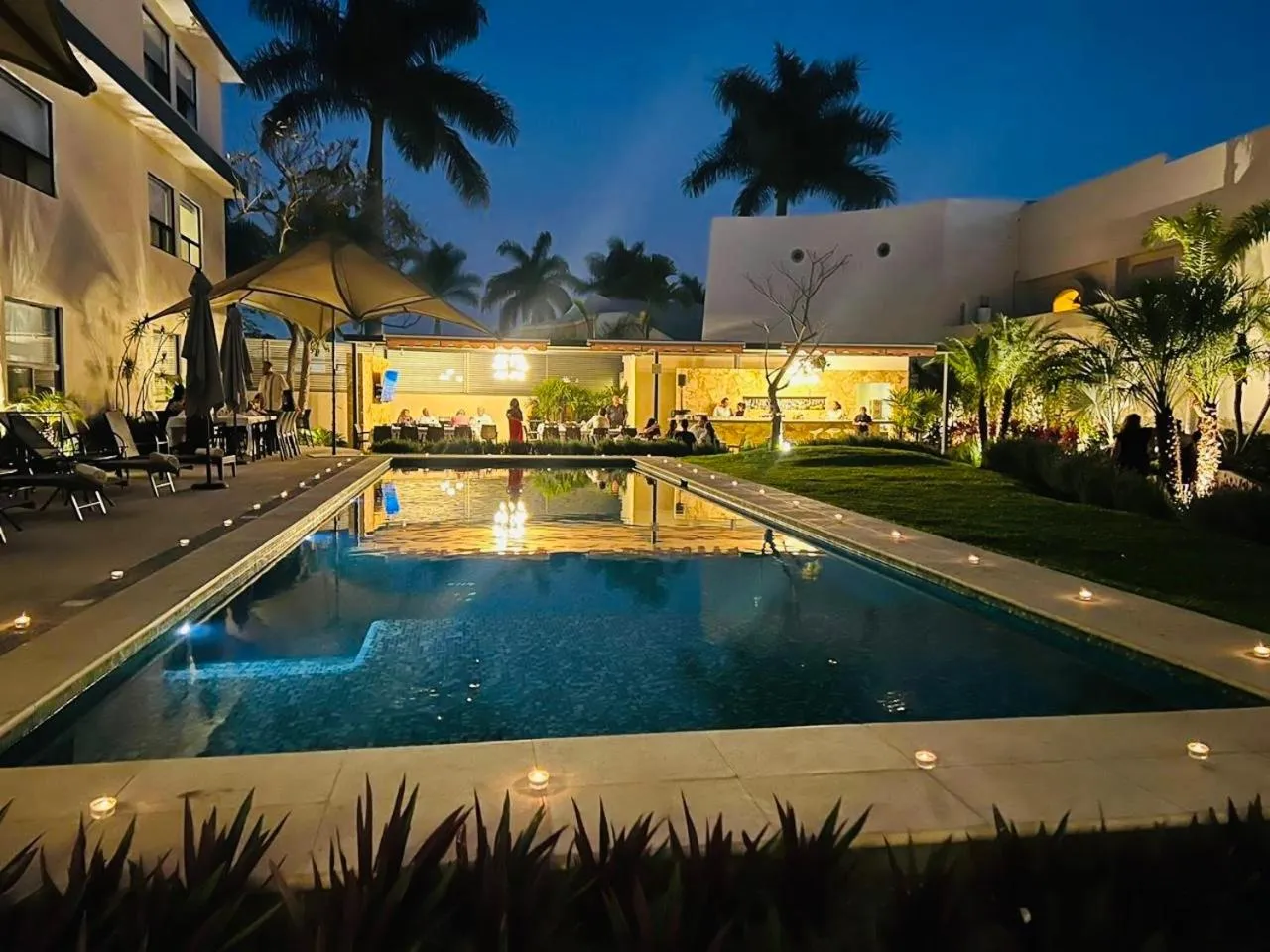Swimming pool in Casa Begonias Hotel mas Villas