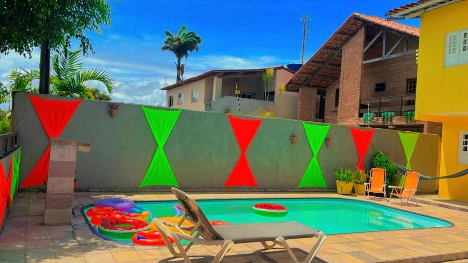 Swimming pool in Pousada Clarice Suítes