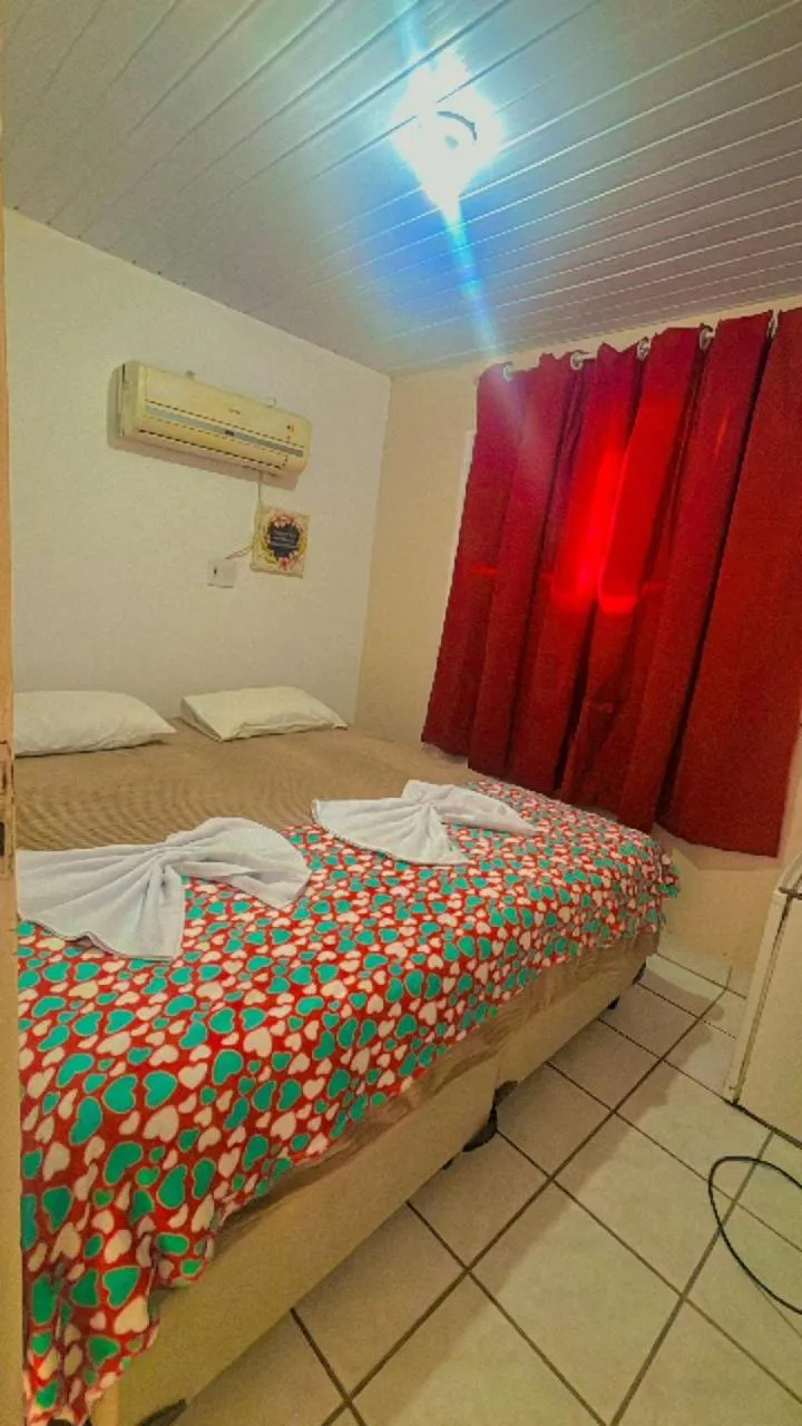Bed in Pousada Clarice Suítes