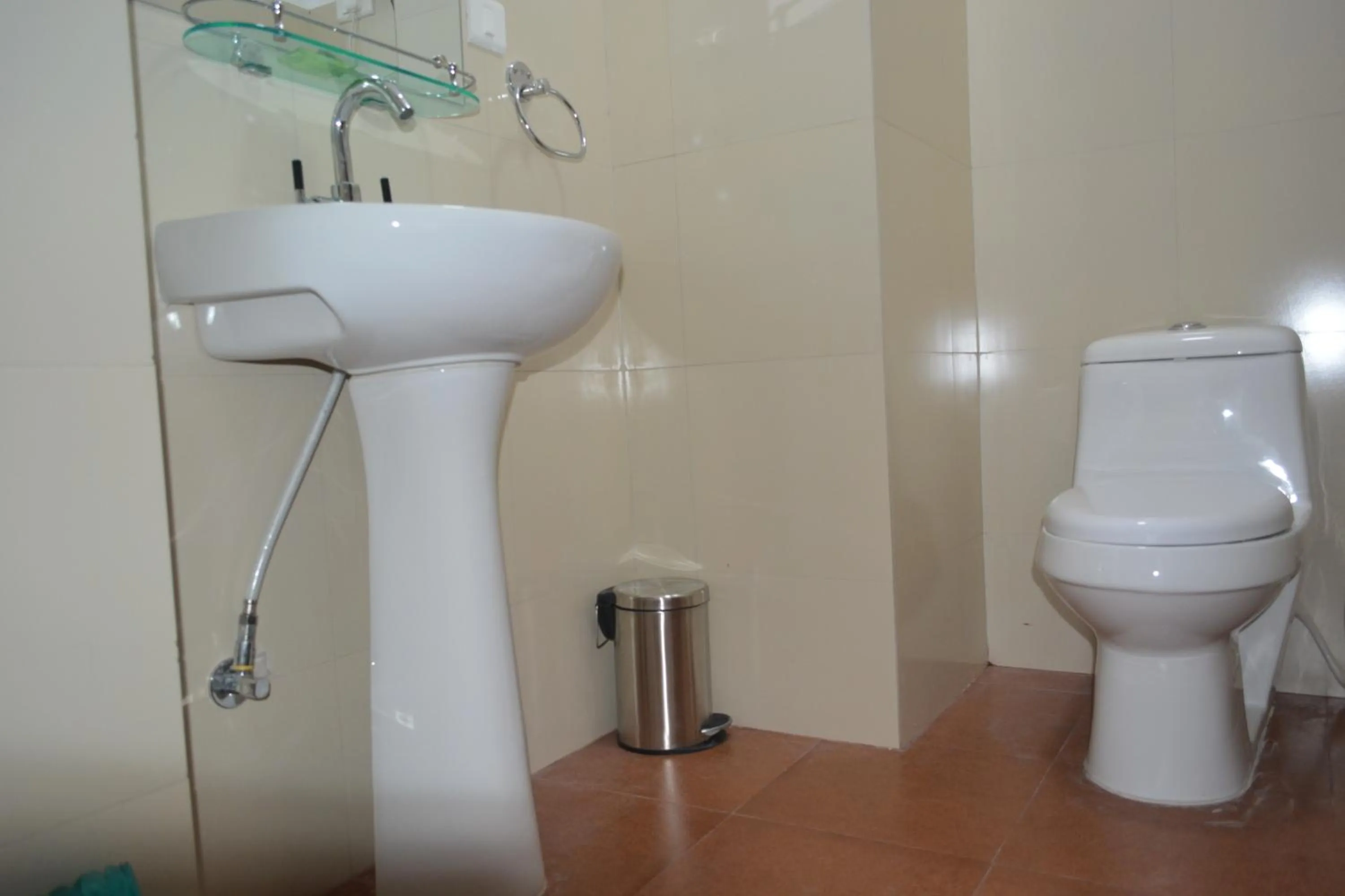 Bathroom in Juniper Residency Hotel