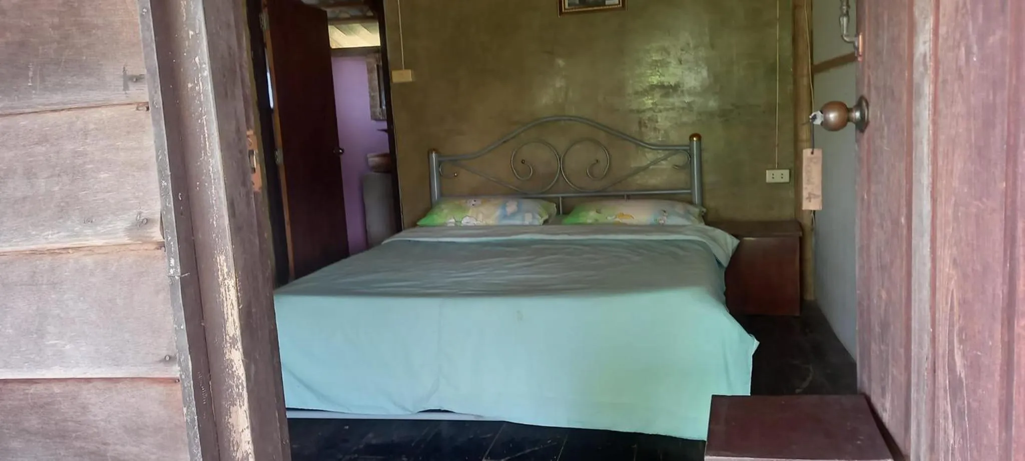 Bed in Tony's Guesthouse