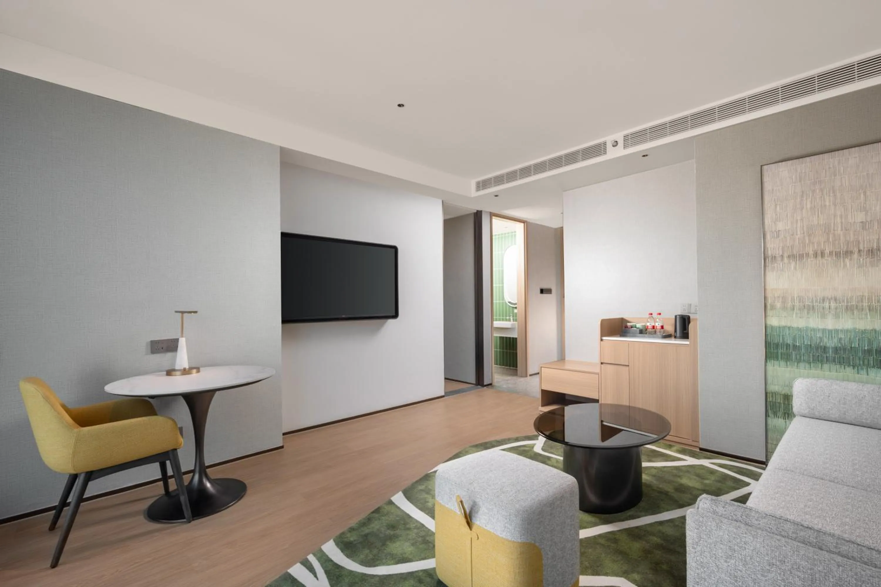 Living room in Holiday Inn & Suites Chongqing Nanan by IHG