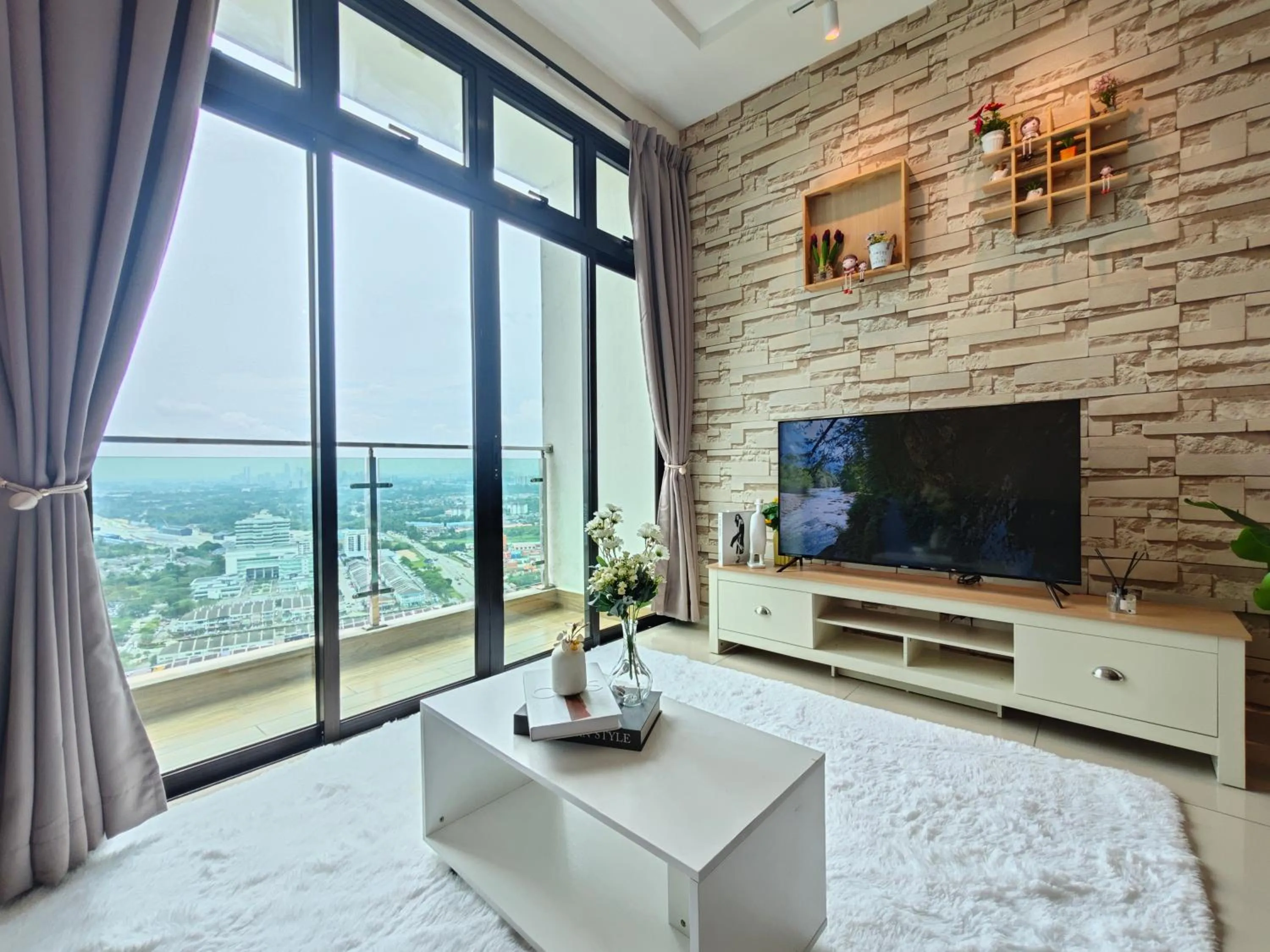 Living room in Kempas Dsummit Residences by Antlerzone