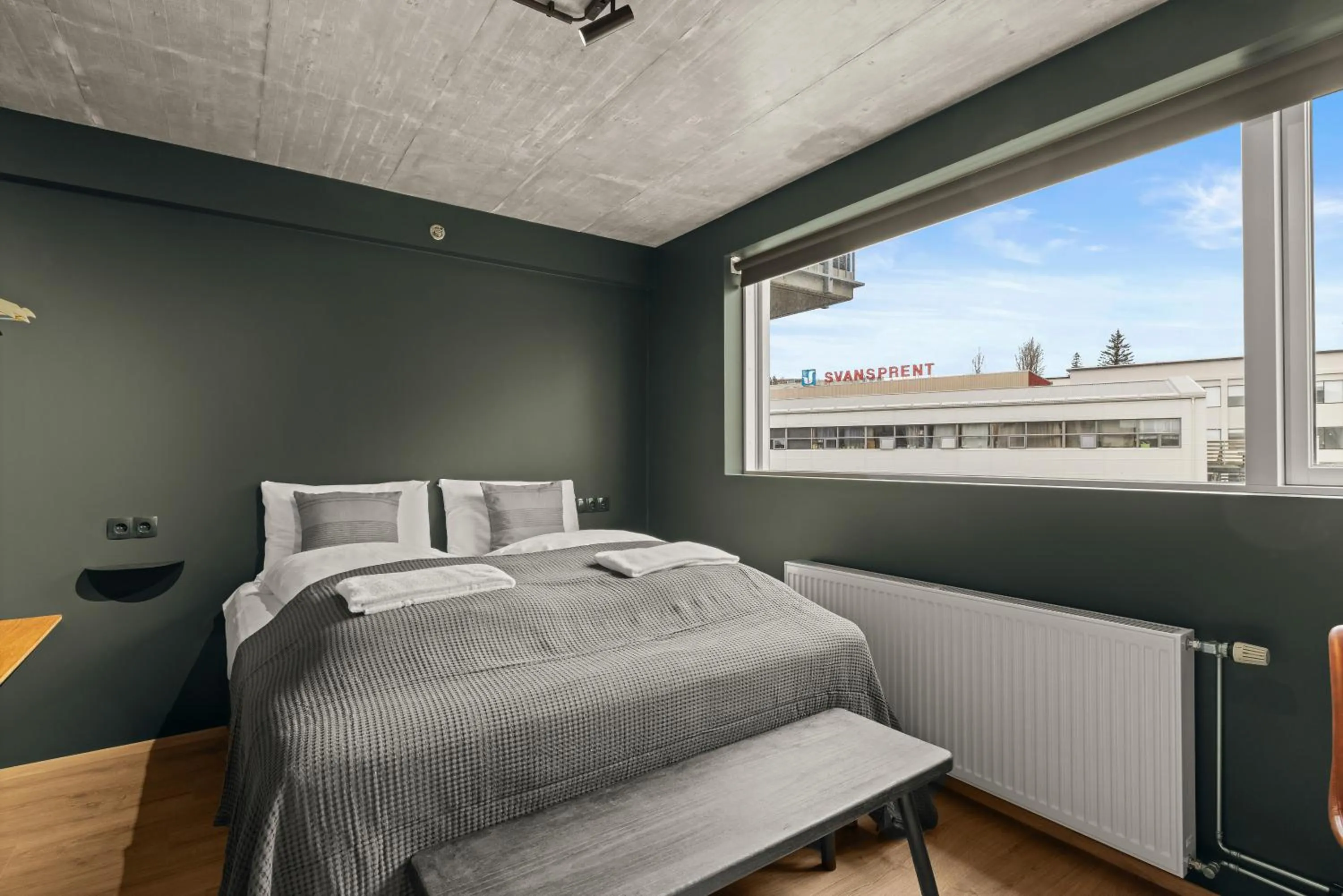 Bed in Aurora Nooks Apartments by Heimaleiga