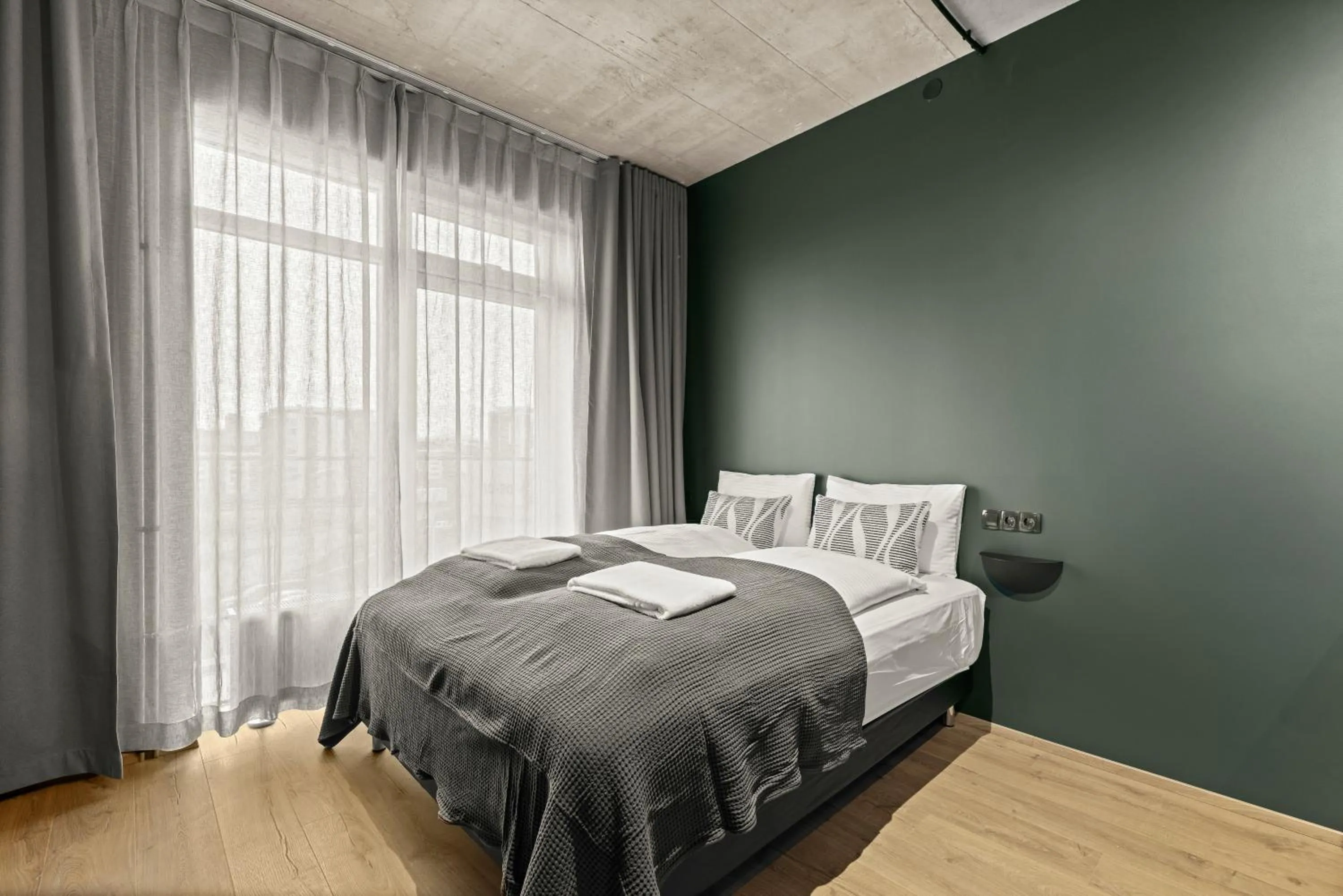 Bed in Aurora Nooks Apartments by Heimaleiga