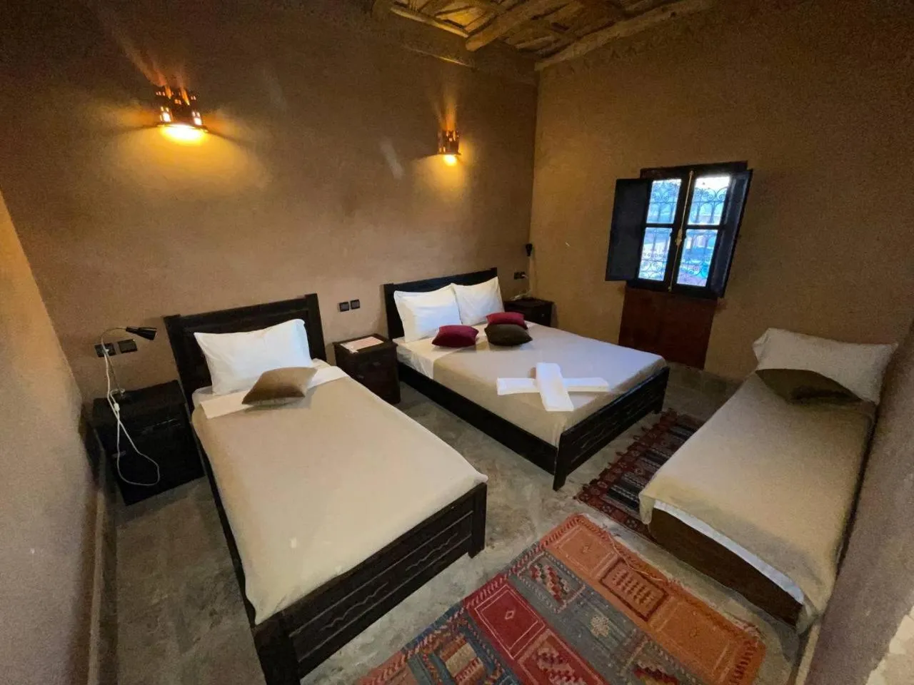 Photo of the whole room, Bed in Kasbah Ennakb