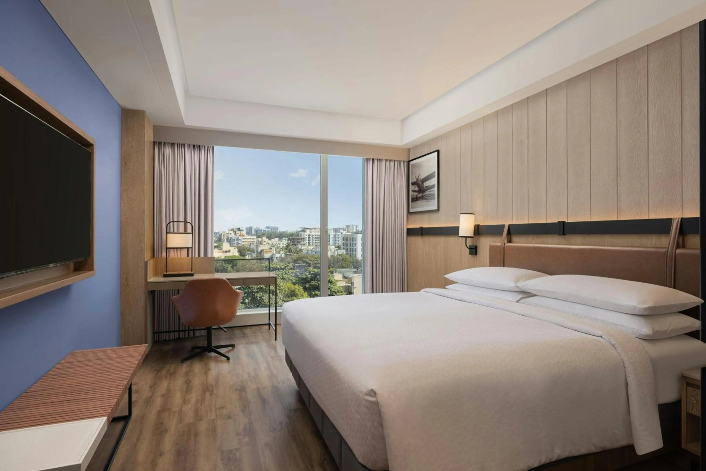 Photo of the whole room, Bed in Four Points by Sheraton Nashik