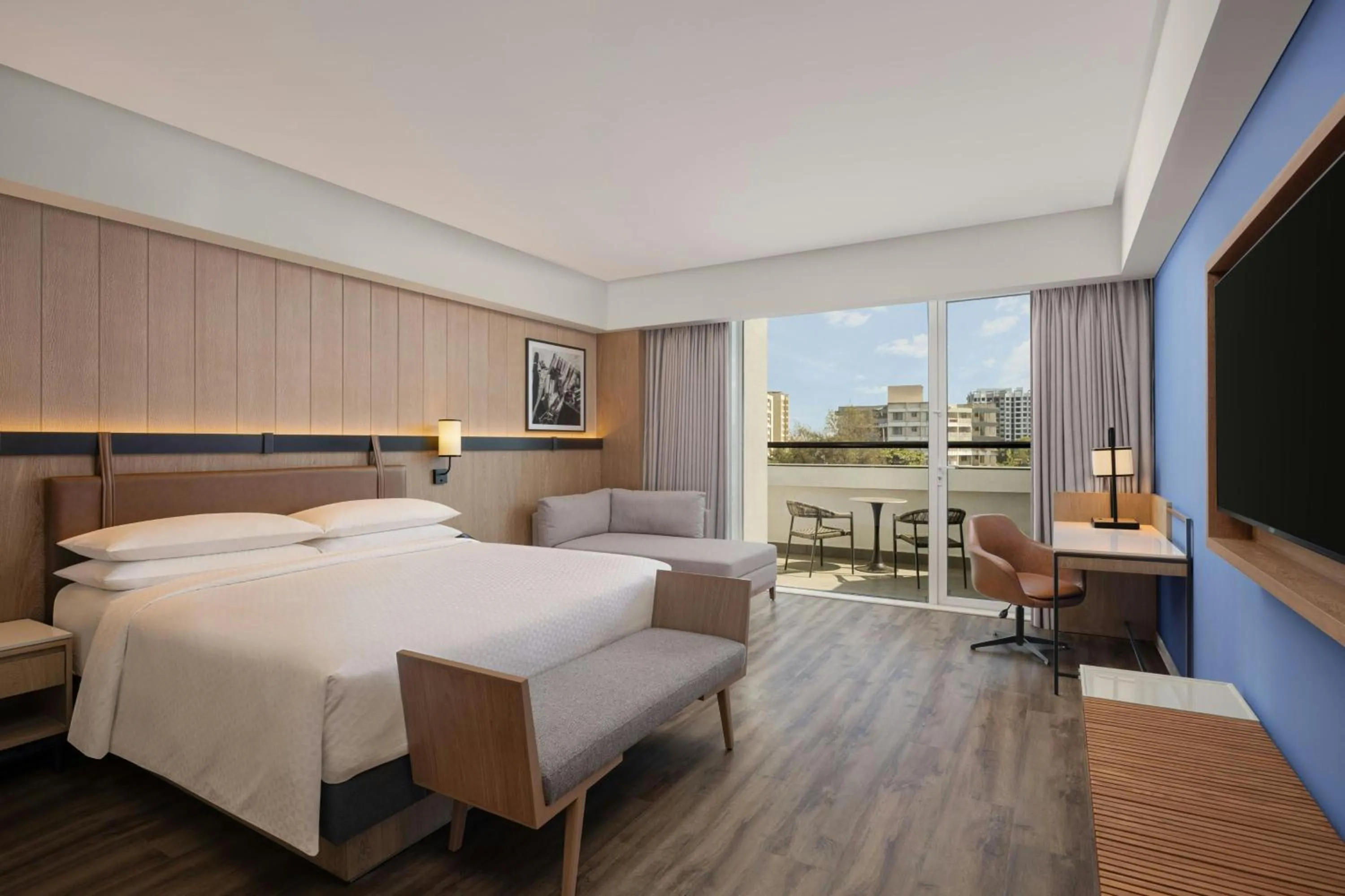 Photo of the whole room, Bed in Four Points by Sheraton Nashik