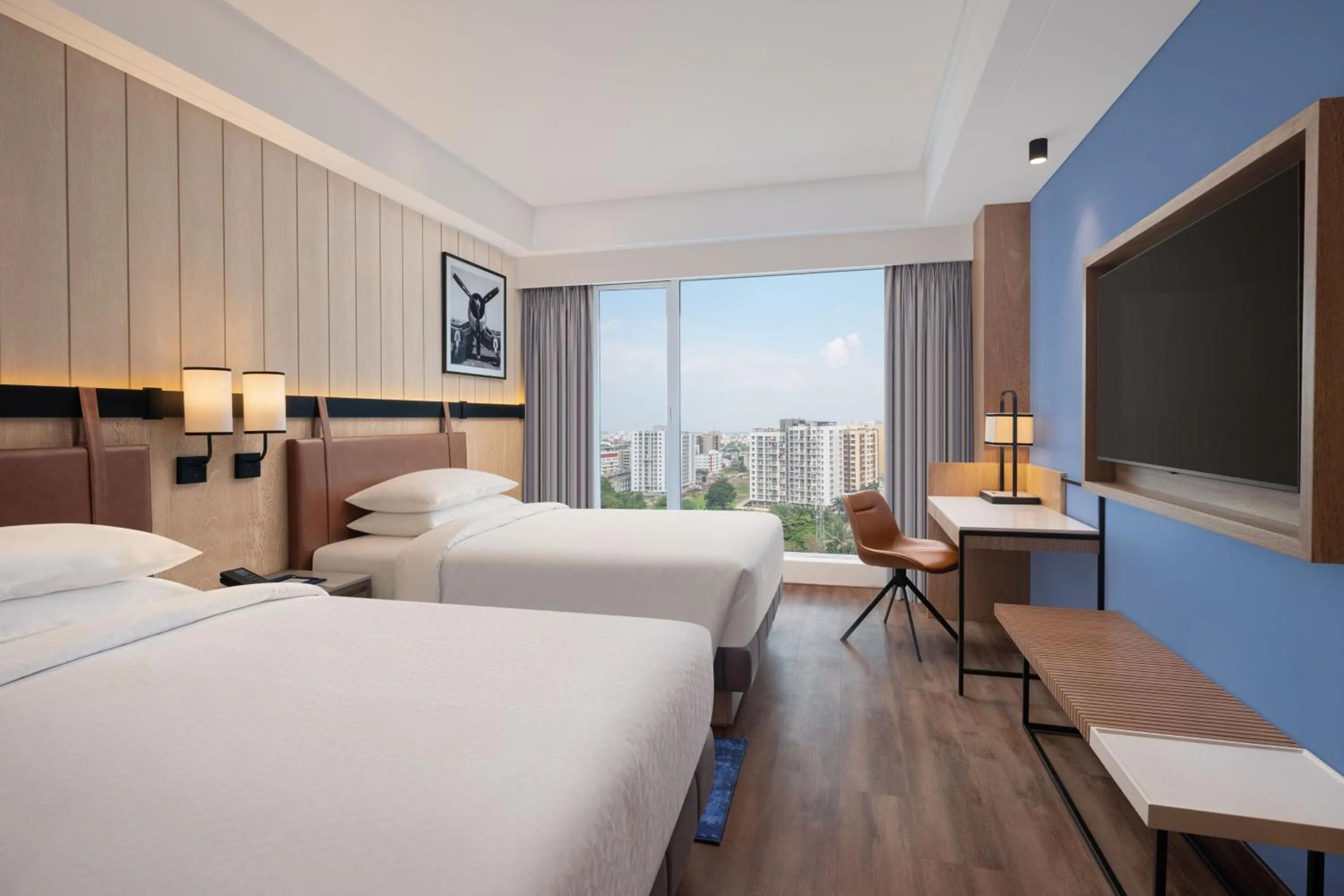 Photo of the whole room, Bed in Four Points by Sheraton Nashik