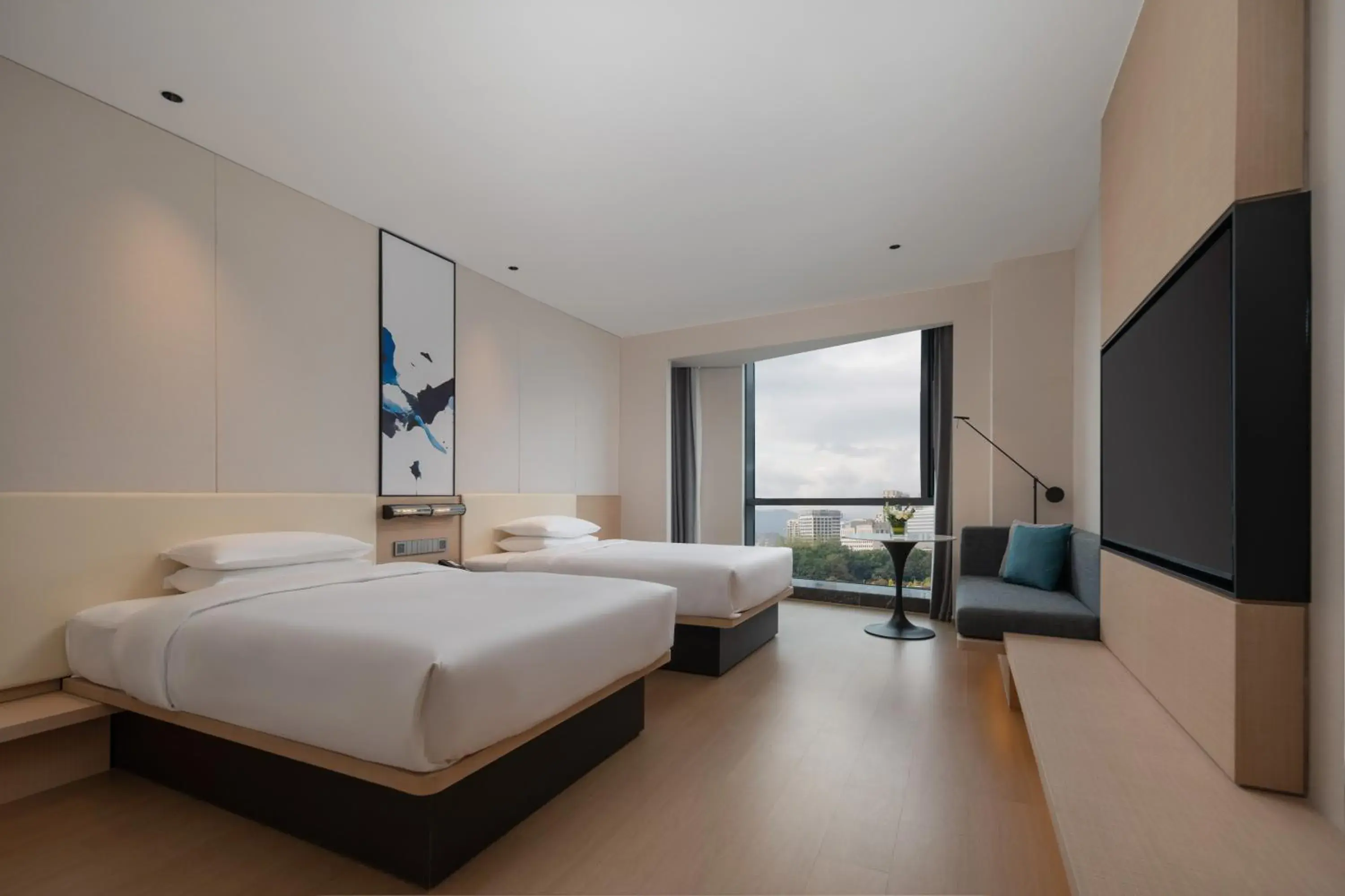 Family Room with Two Double Beds in Fairfield by Marriott Yiwu Family Room with Two Double Beds in Fairfield by Marriott Yiwu