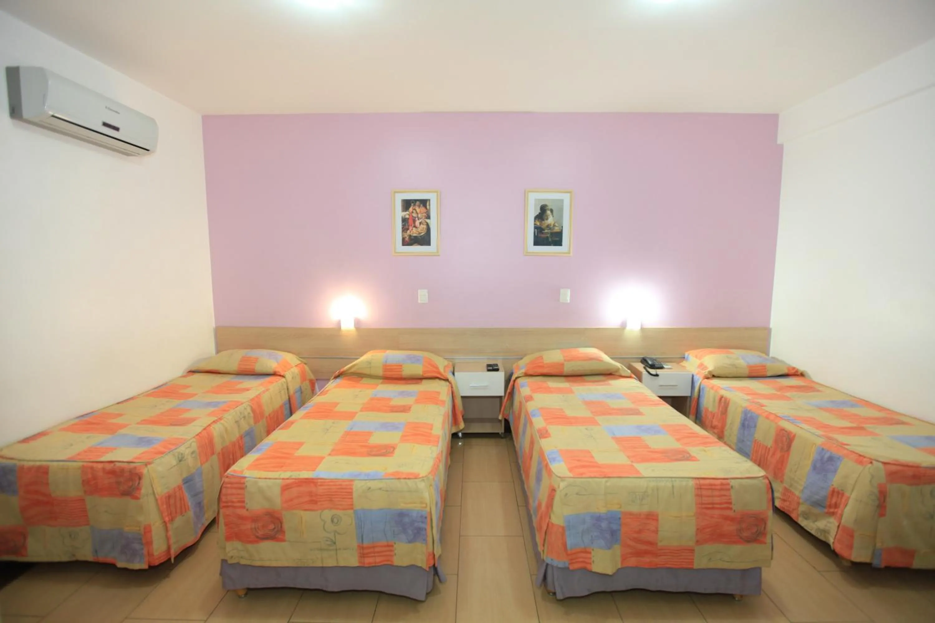 Bed in Hotel Oly Plaza