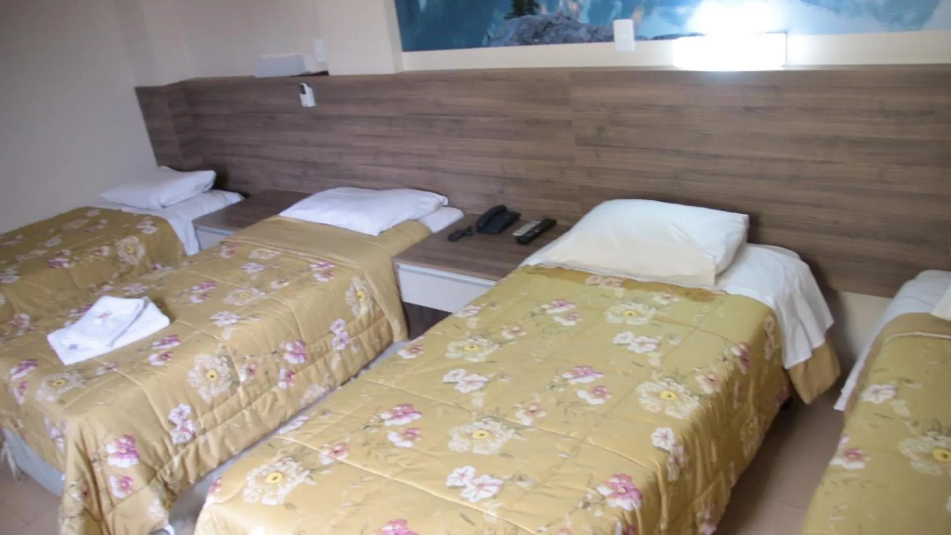 Bed in Hotel Oly Plaza