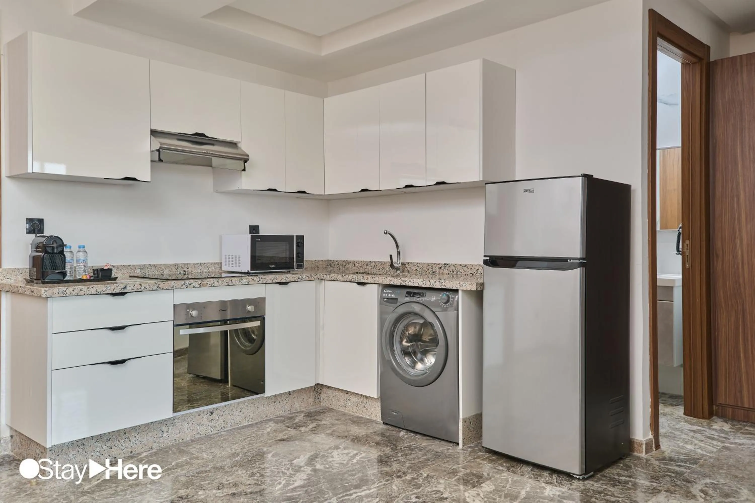 Kitchen or kitchenette in StayHere Casablanca - Oasis - Premium Residence