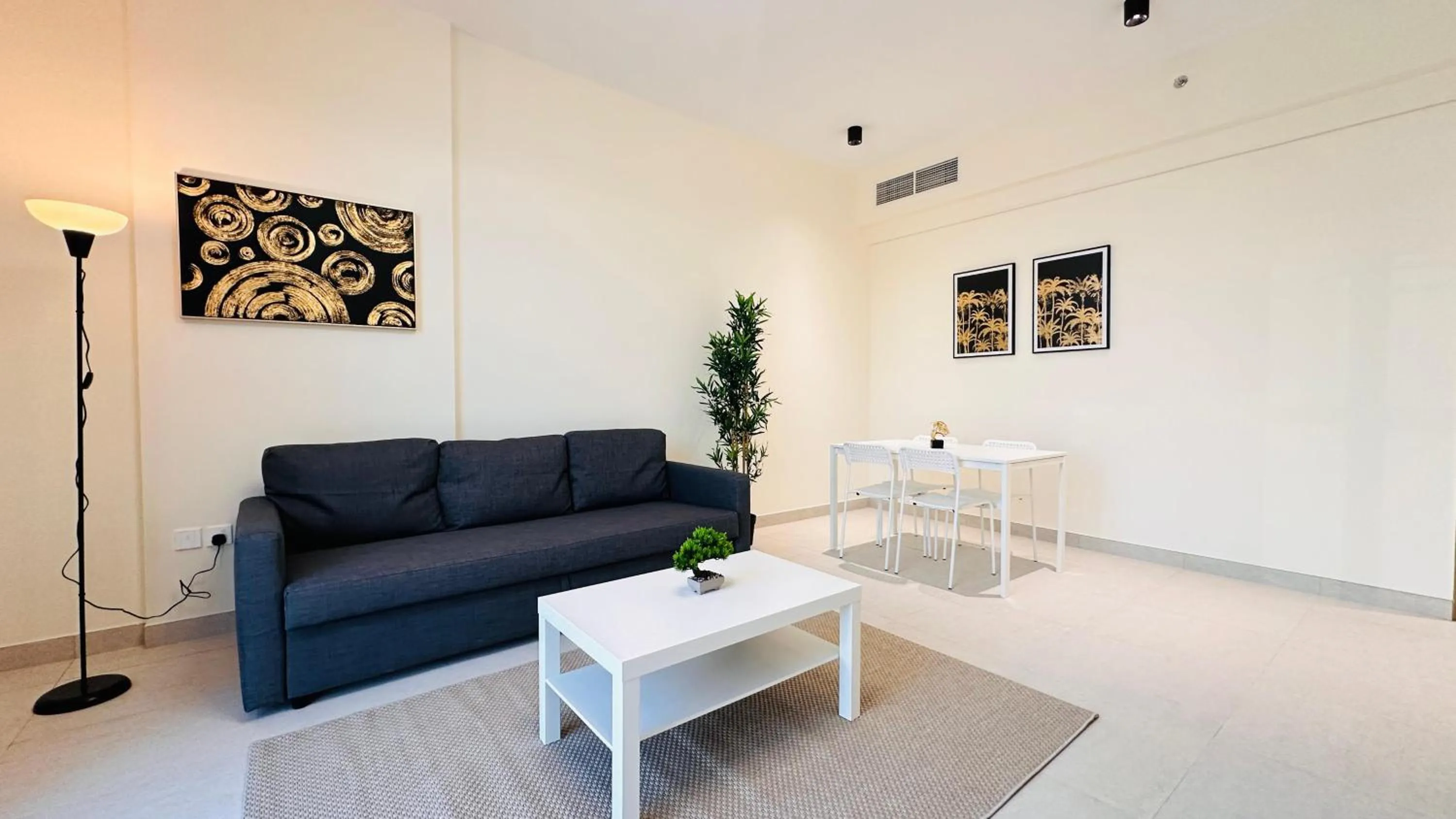 Seating area in Sunday Sheikh Zayed Road Concord Tower by Belvilla