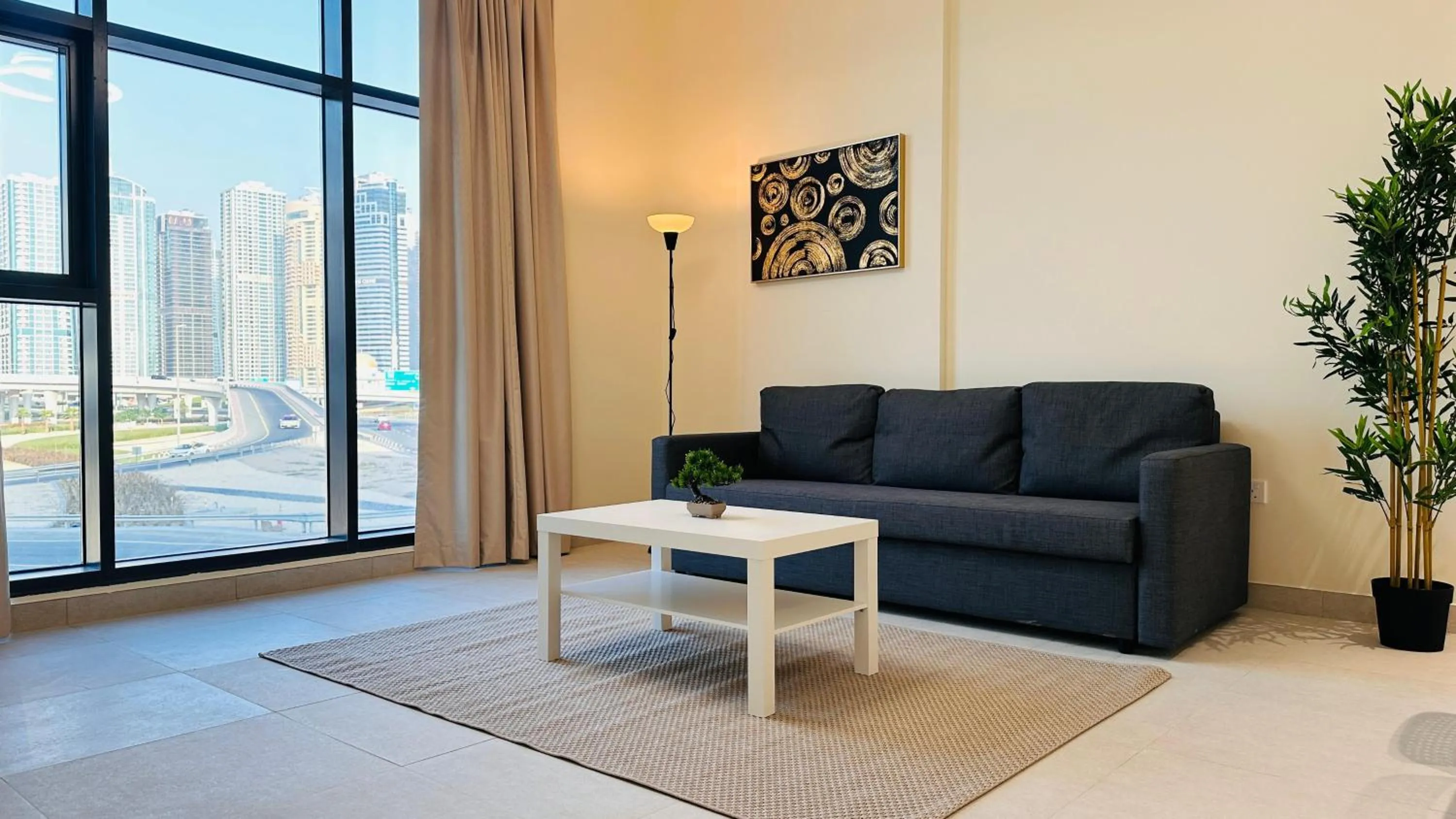 Seating area in Sunday Sheikh Zayed Road Concord Tower by Belvilla