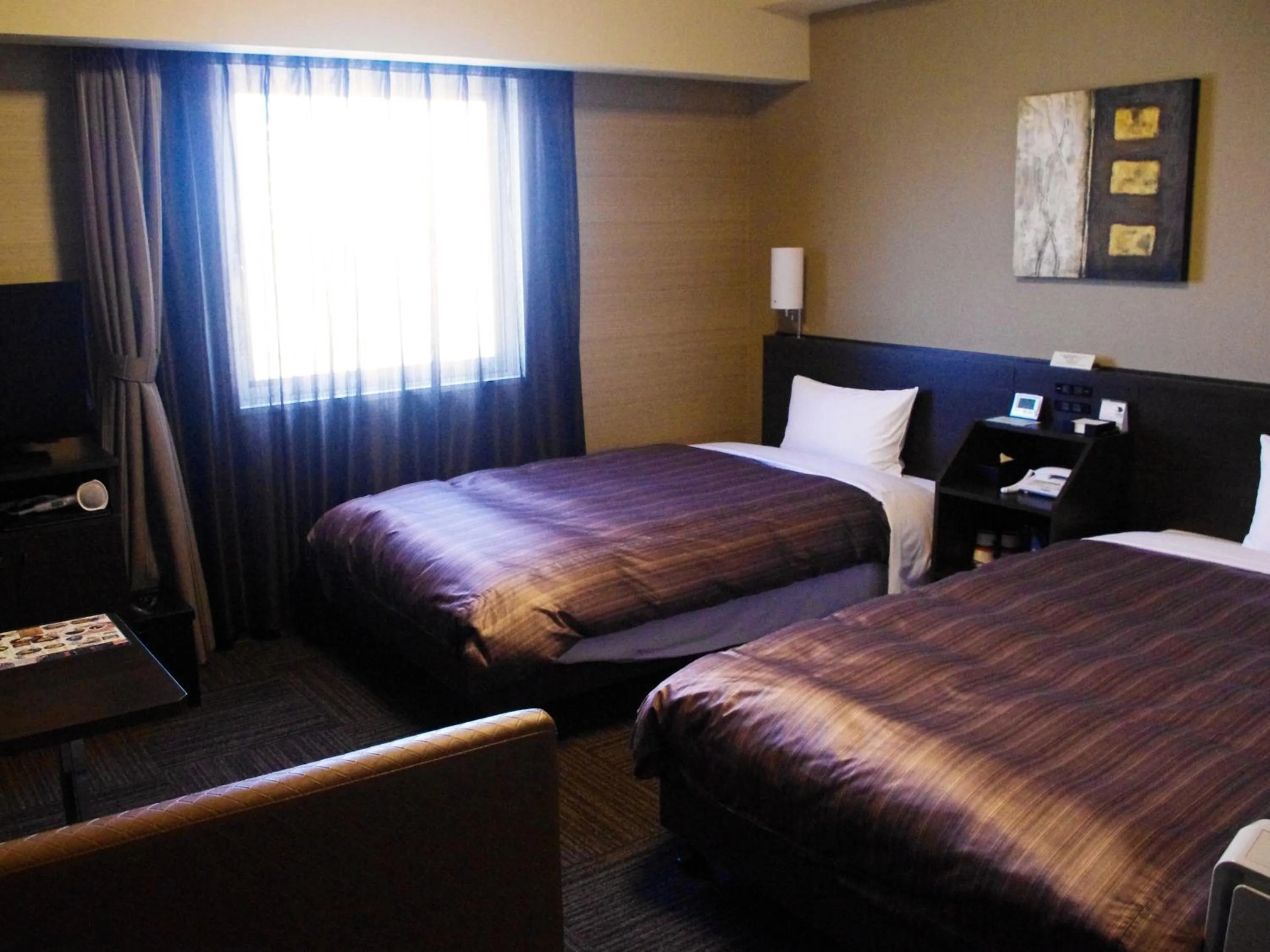 Photo of the whole room, Bed in Hotel Route Inn Hamamatsu Dealer Dori