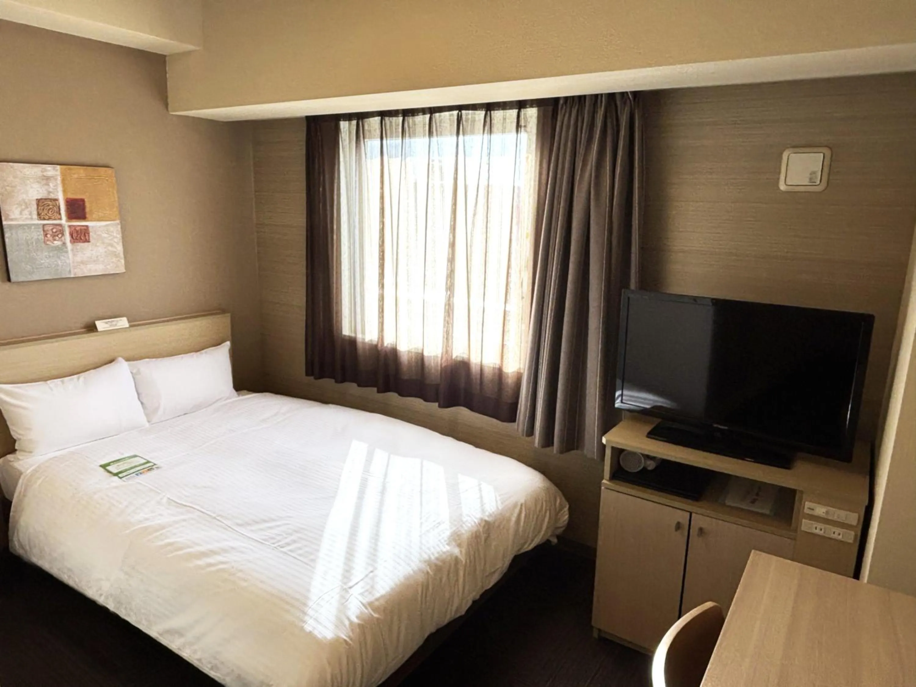 Photo of the whole room, Bed in Hotel Route Inn Hamamatsu Dealer Dori