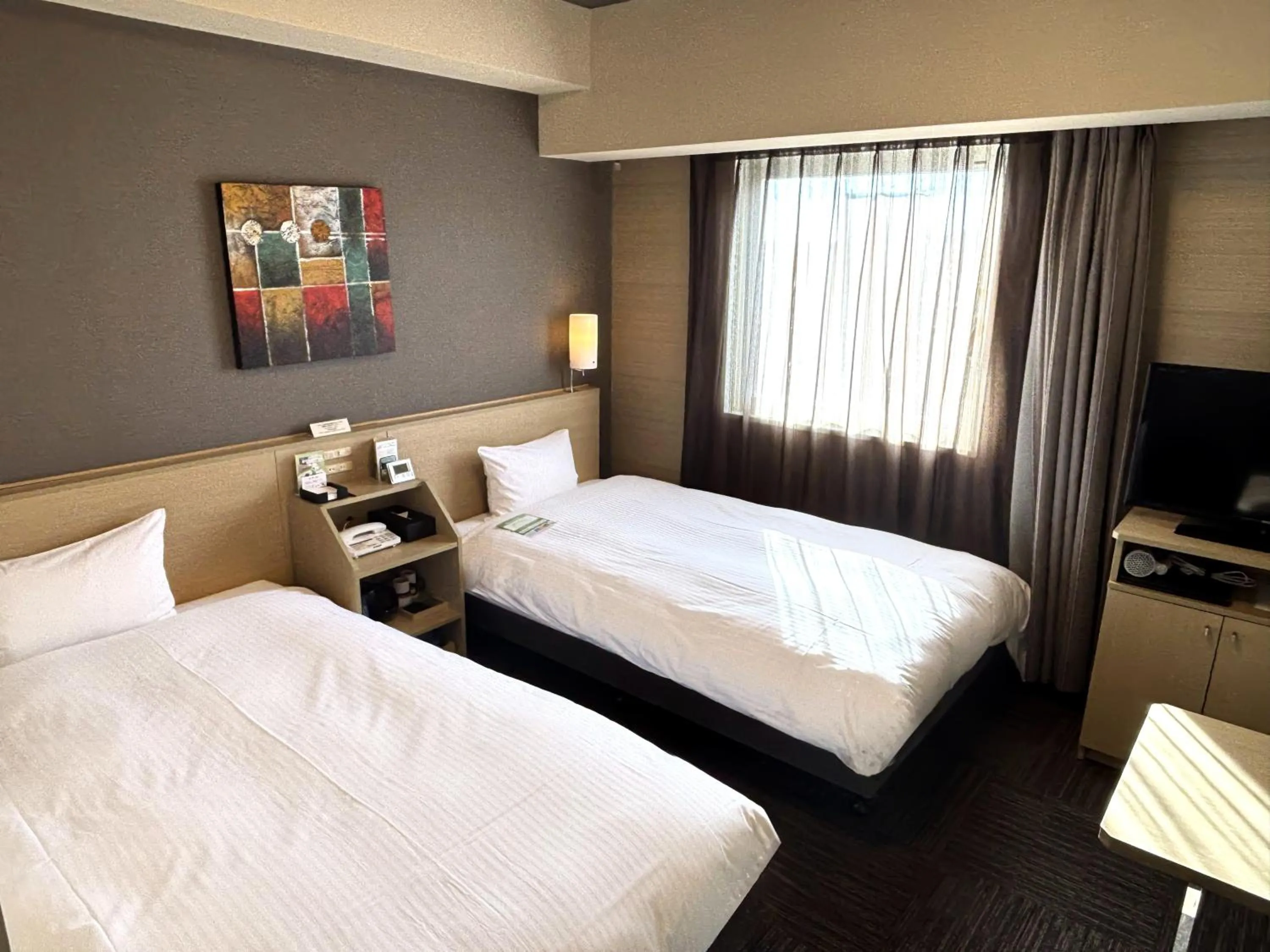 Photo of the whole room, Bed in Hotel Route Inn Hamamatsu Dealer Dori