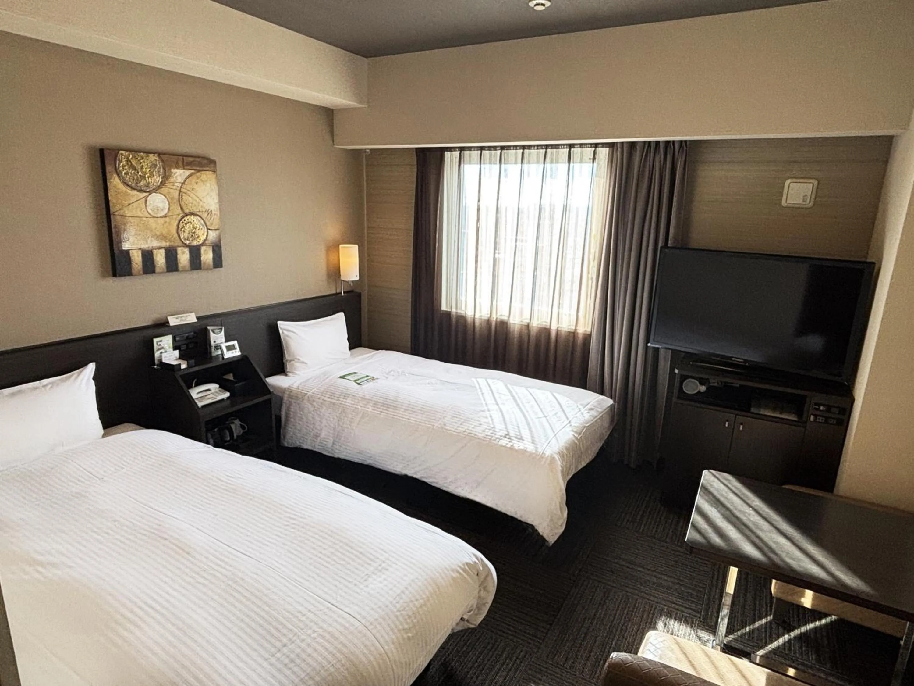Photo of the whole room, Bed in Hotel Route Inn Hamamatsu Dealer Dori