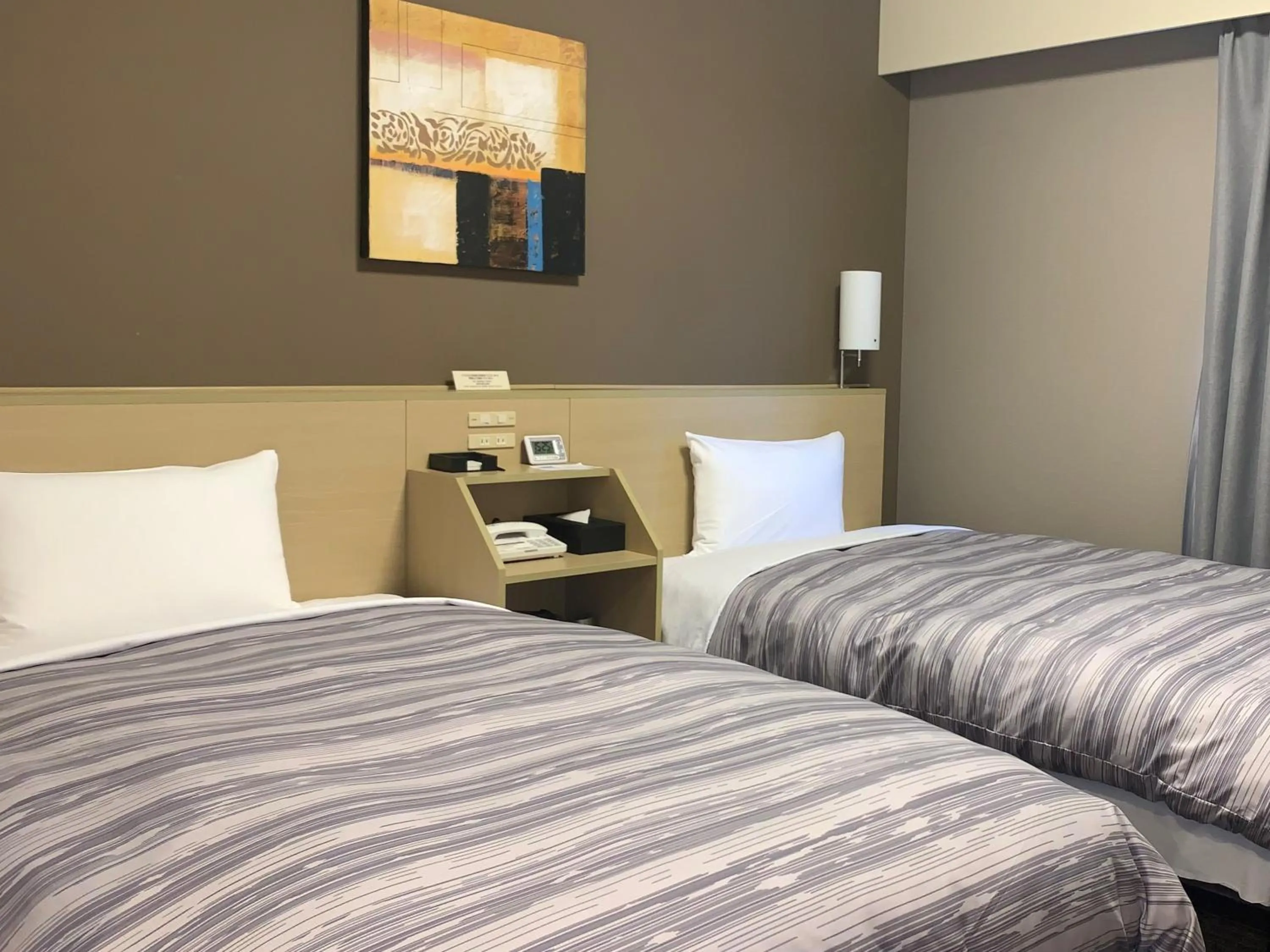 Photo of the whole room, Bed in Hotel Route Inn Hitachinaka