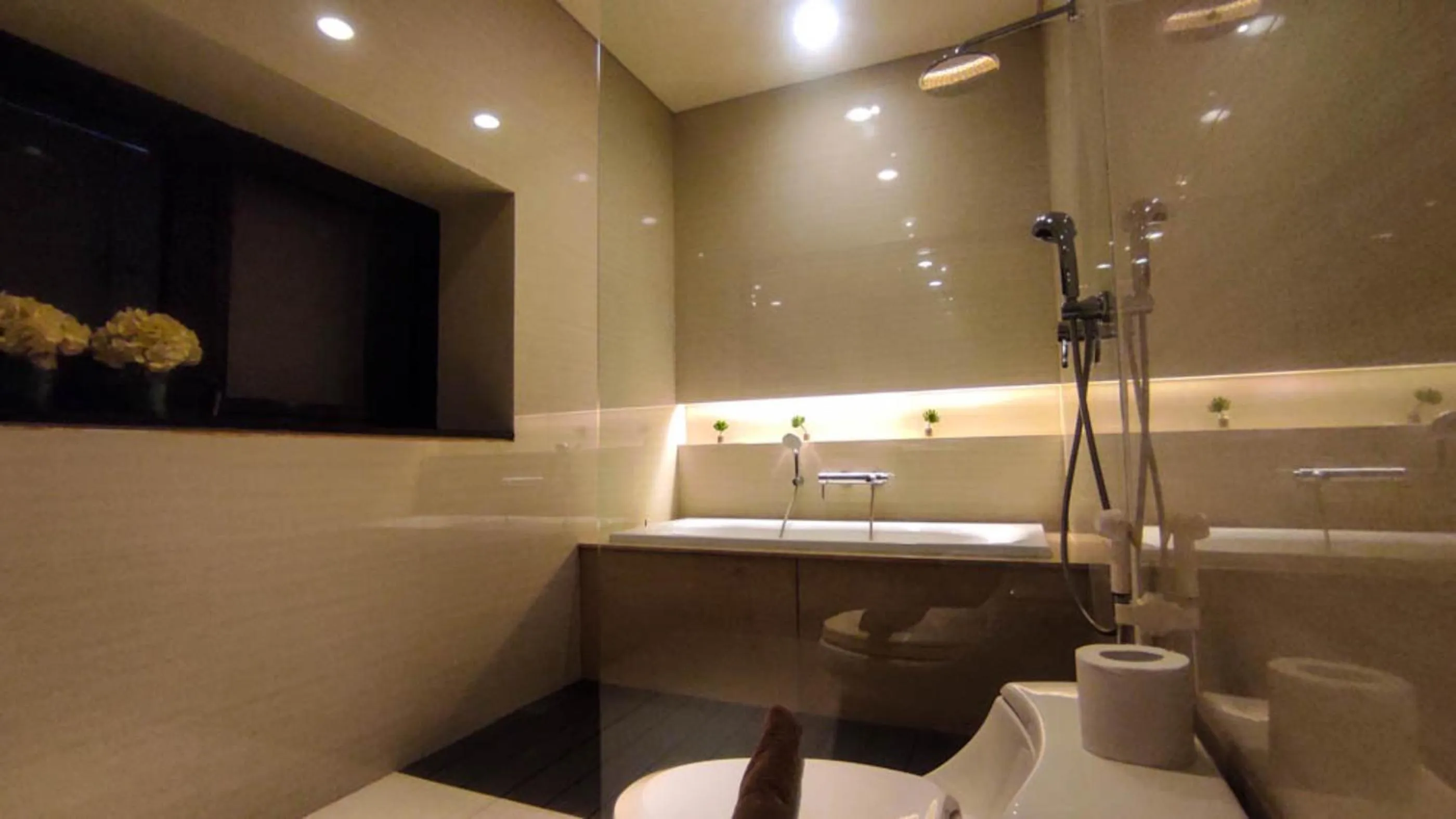 Bathroom in Apartment 3BR with River View in City Center at Sumatra36 Surabaya By Travelio