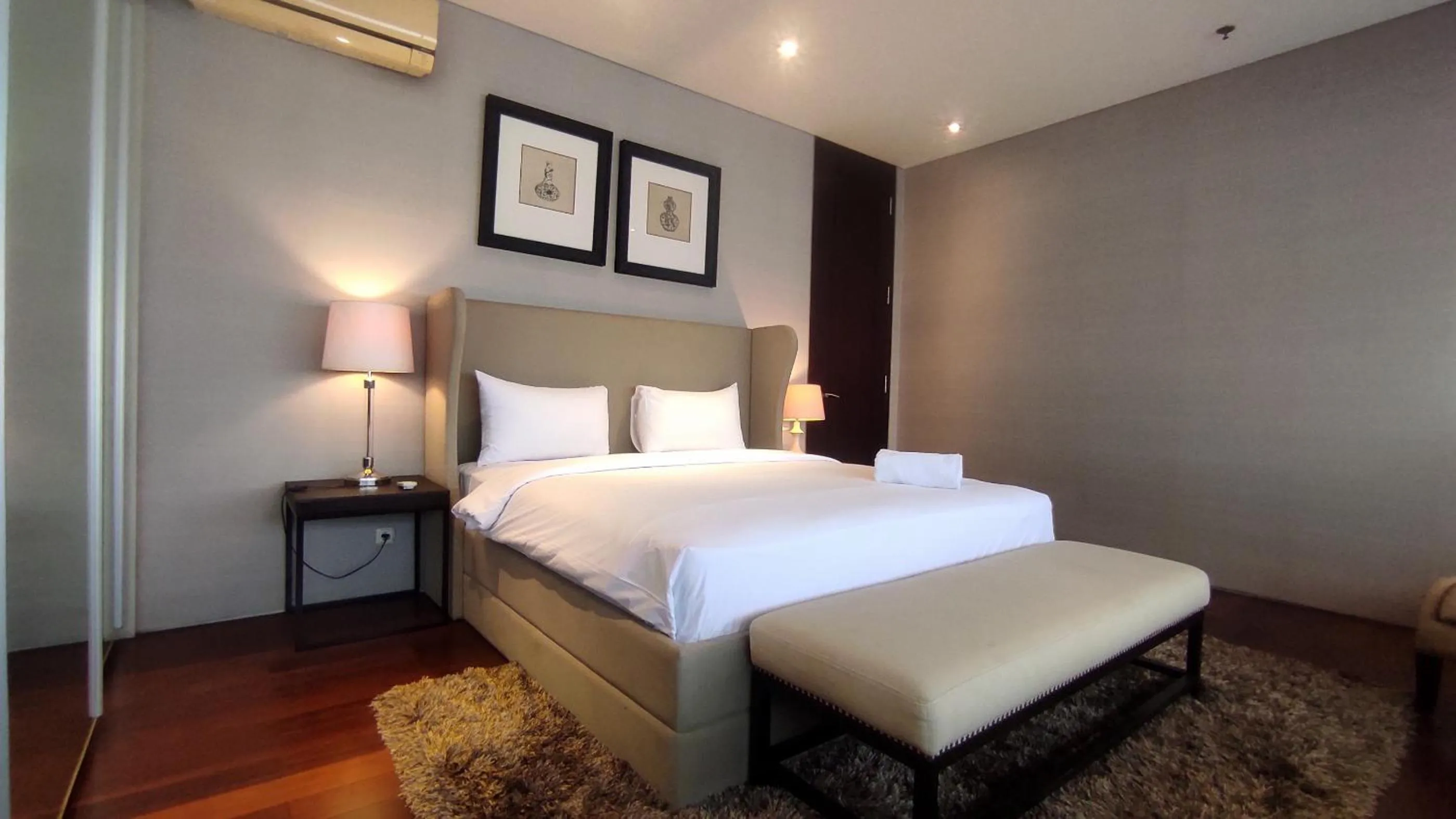 Bed in Apartment 3BR with River View in City Center at Sumatra36 Surabaya By Travelio