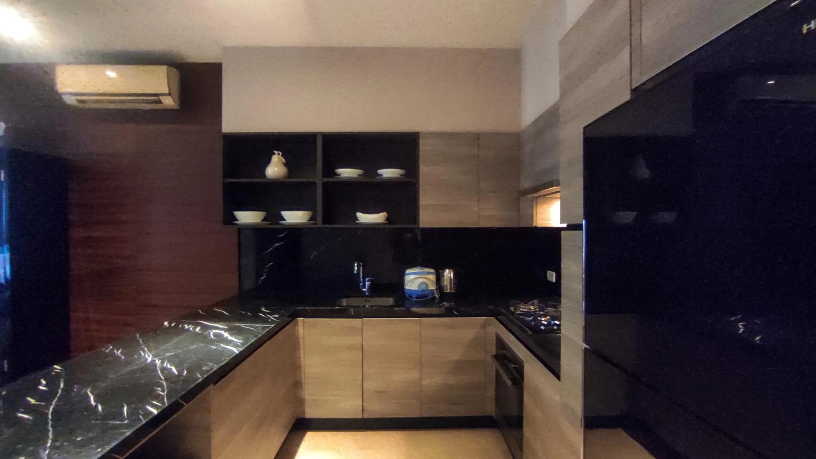 Kitchen or kitchenette in Apartment 3BR with River View in City Center at Sumatra36 Surabaya By Travelio