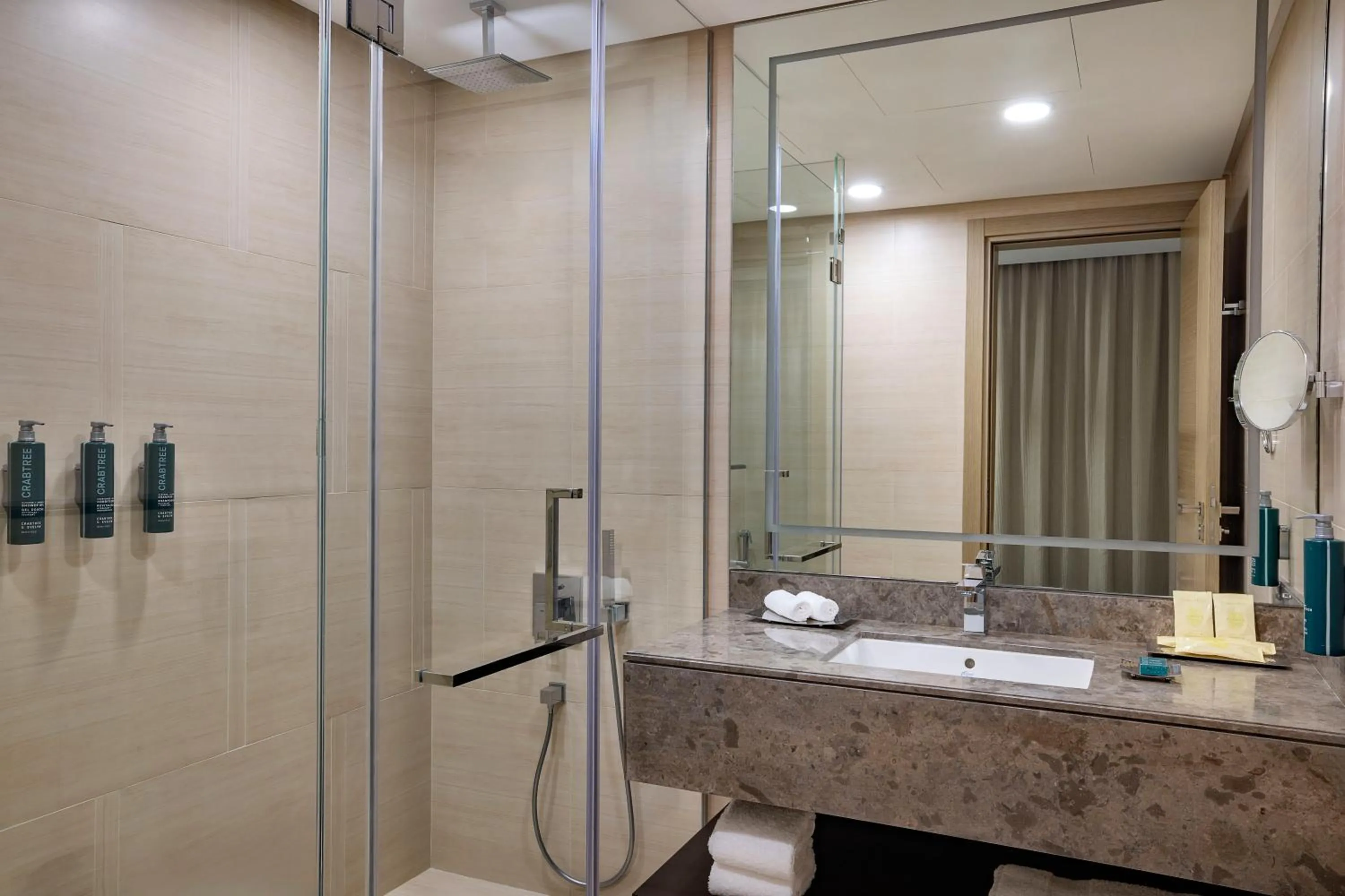 Shower in Hilton Bahrain City Centre Hotel & Residences
