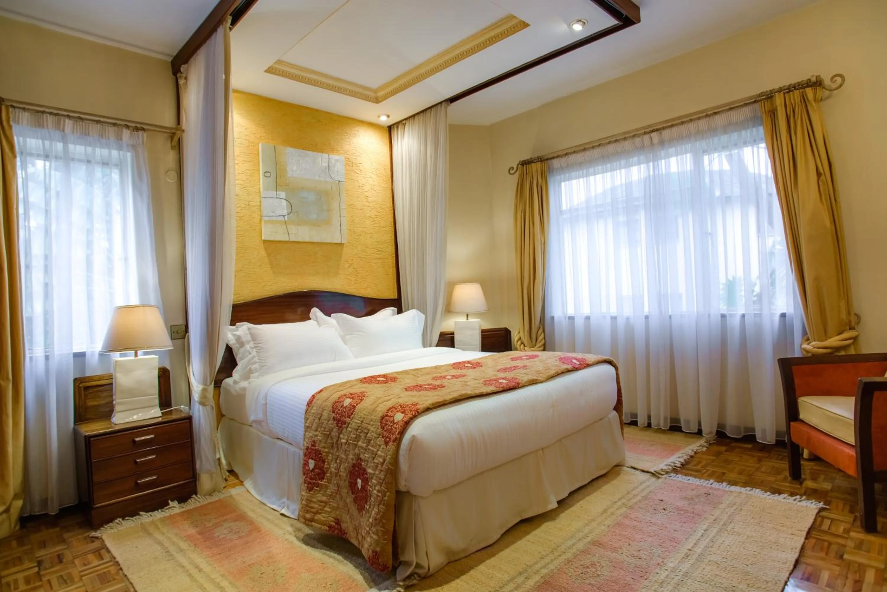 Bed in Mimosa Court Apartments