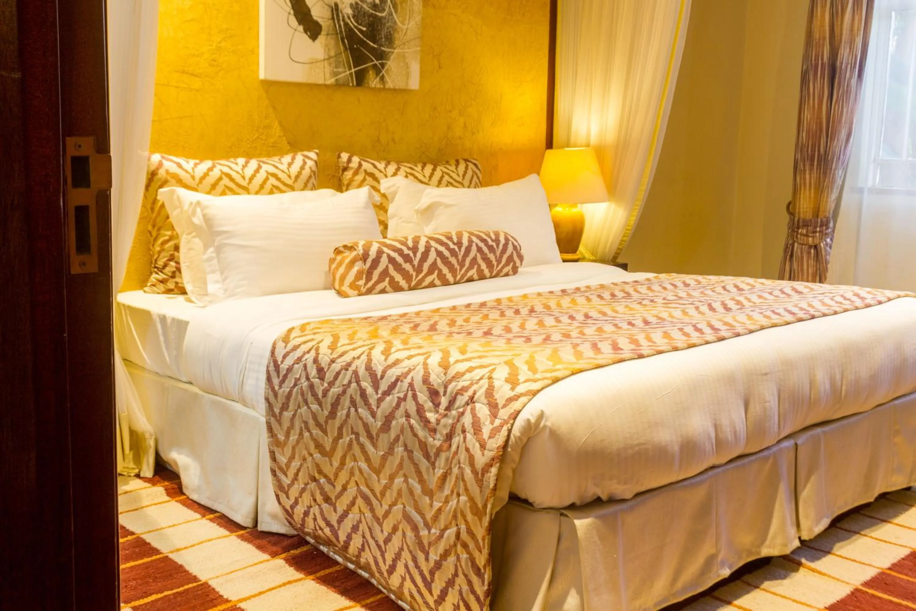 Bedroom, Bed in Mimosa Court Apartments