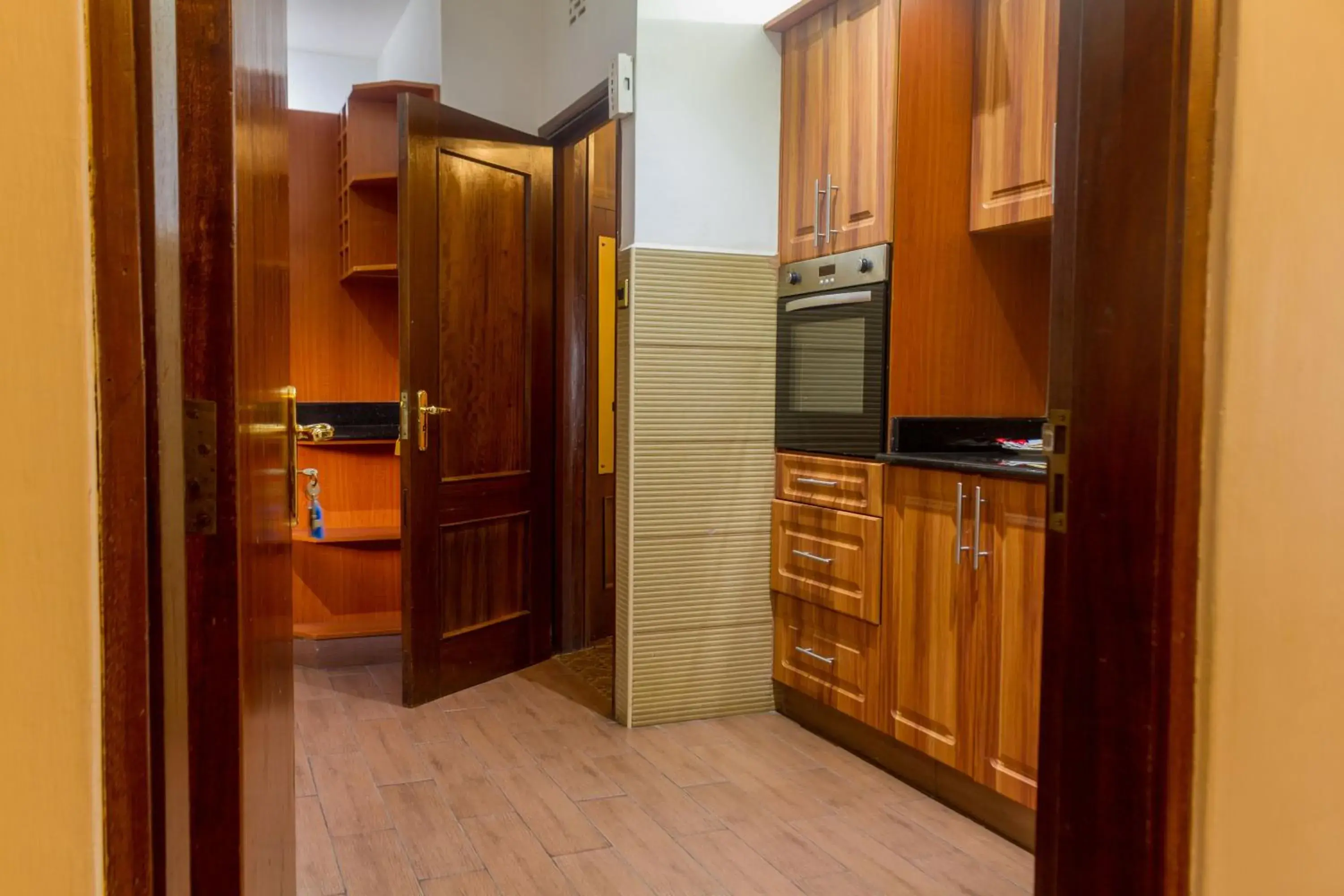 Three-Bedroom Apartment in Mimosa Court Apartments Three-Bedroom Apartment in Mimosa Court Apartments