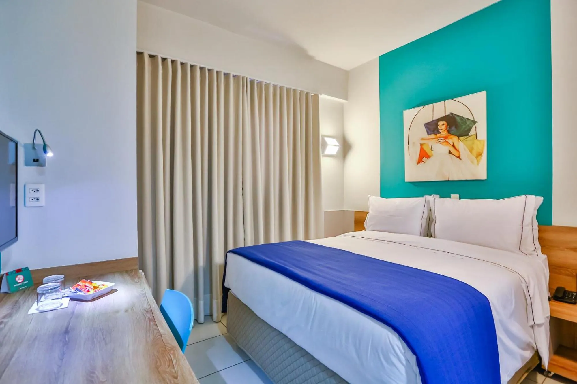 Bed in Mega Moda Goiania Hotel