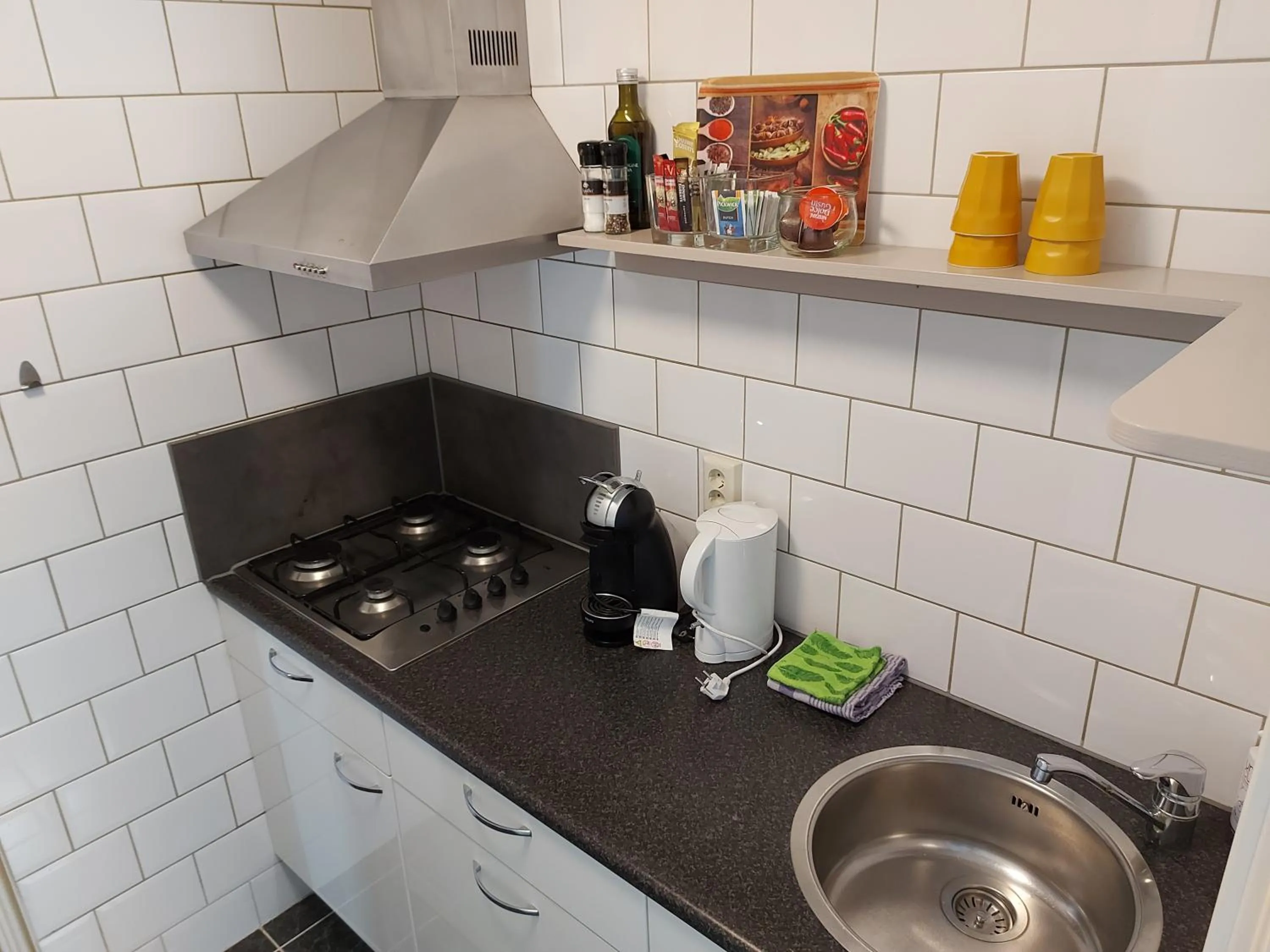 Kitchen or kitchenette in Prins Appartementen