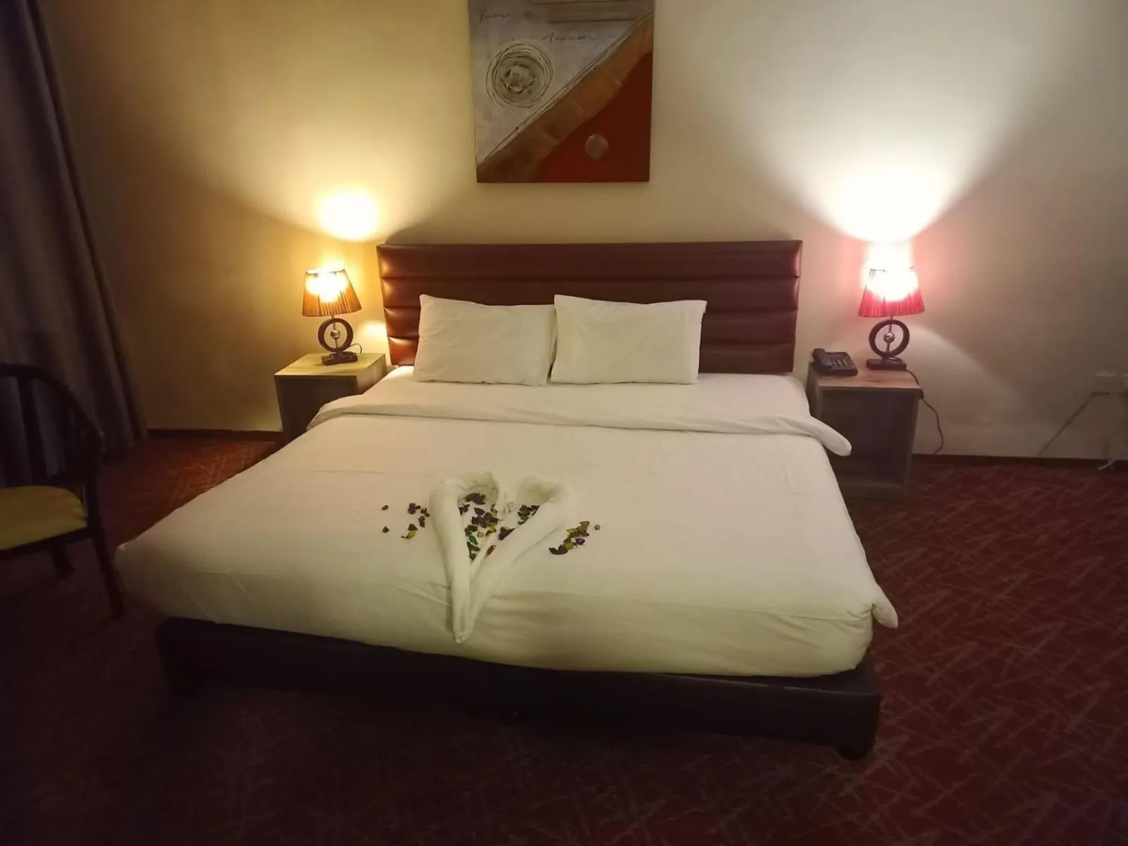 Bed in The Signature Hotel Amman