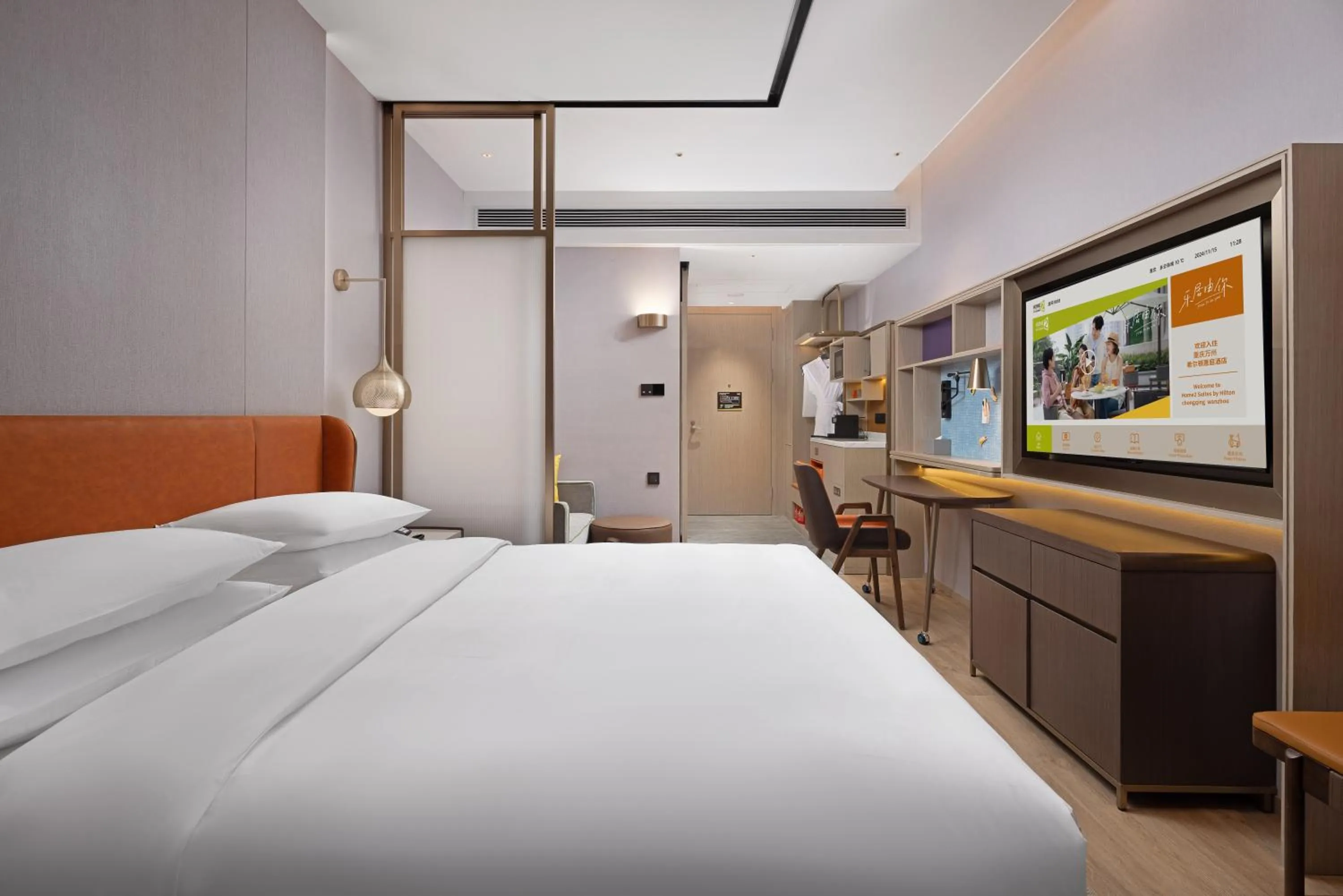 Photo of the whole room, Bed in Home2 Suite by Hilton Chongqing Wanzhou