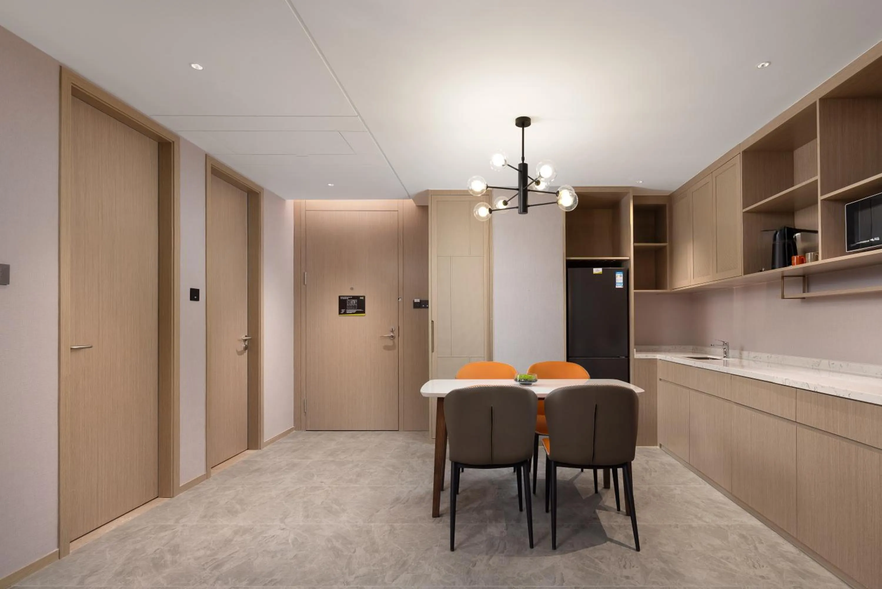 Living room in Home2 Suite by Hilton Chongqing Wanzhou