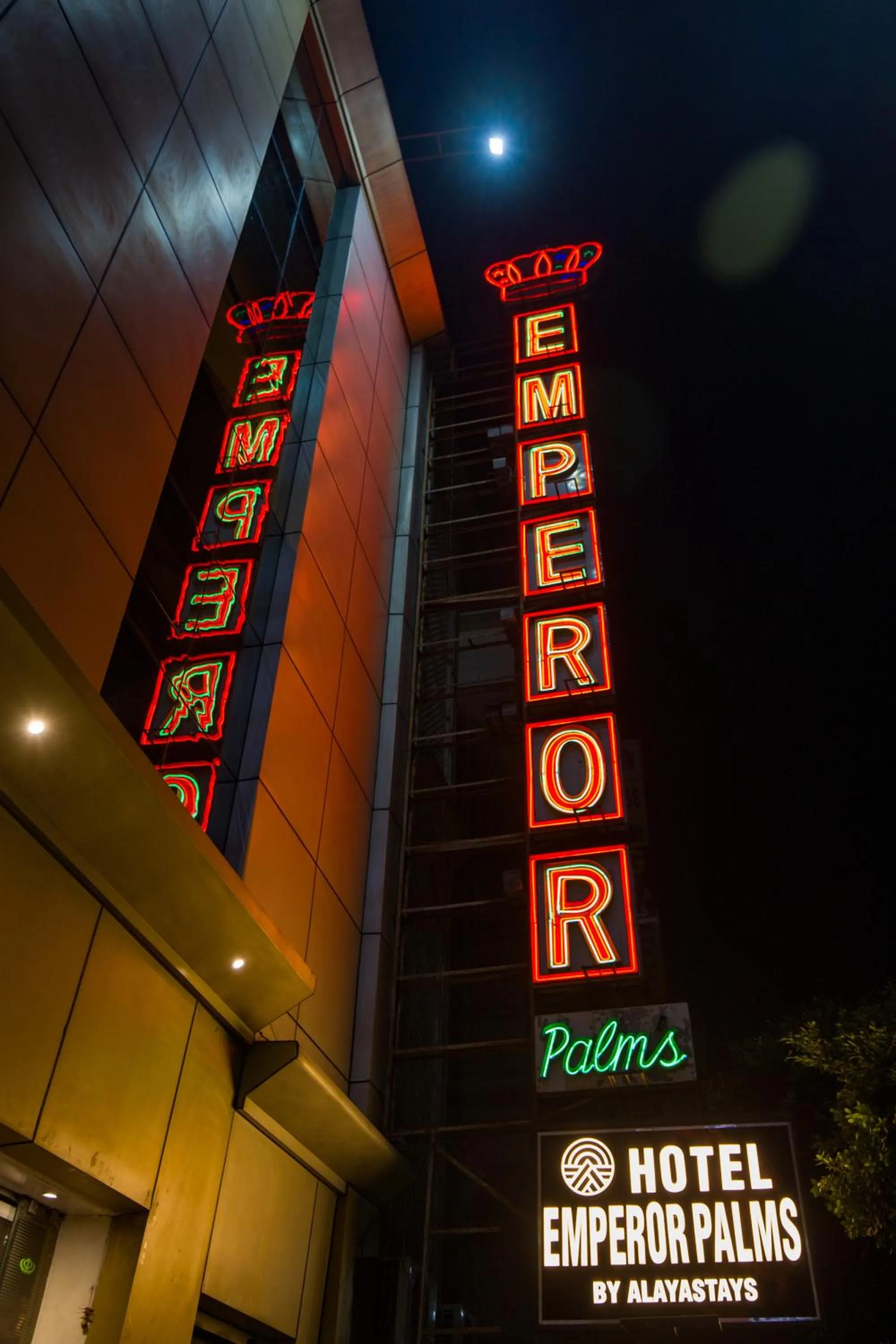 Property logo or sign in Alaya Stays Hotel Emperor Palms