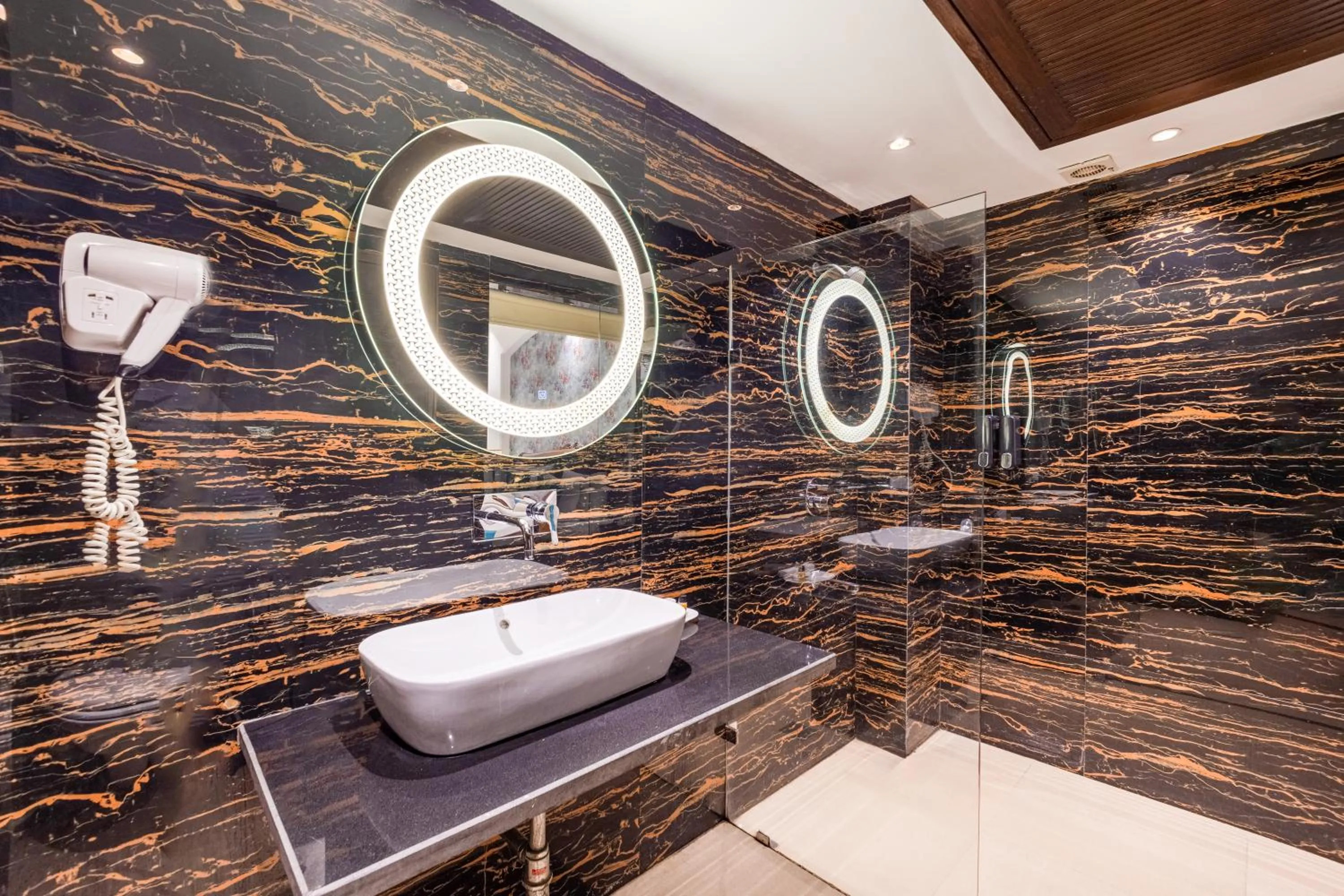 Bathroom in Alaya Stays Hotel Emperor Palms