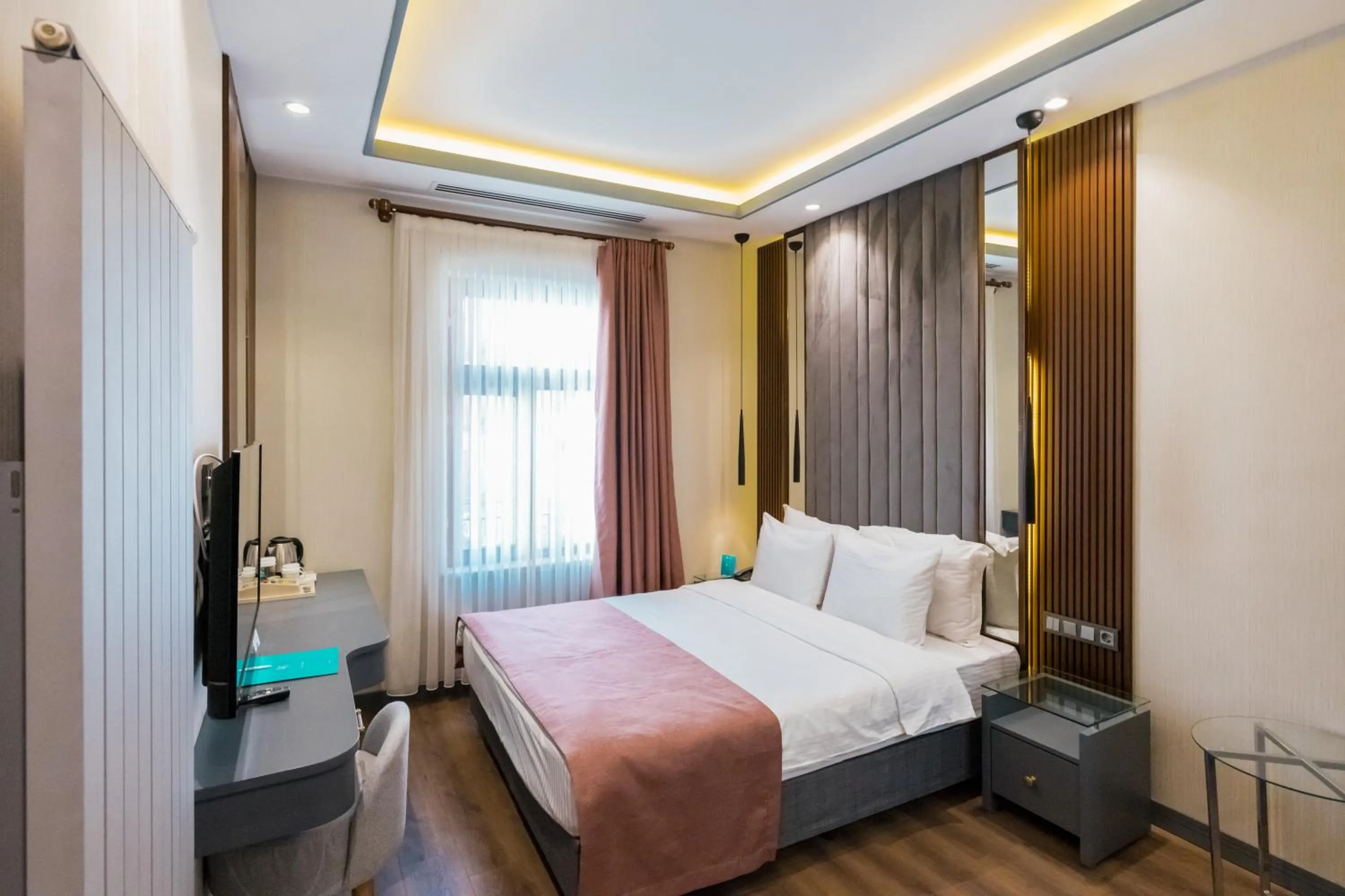 Bed in VE Hotels Adakale