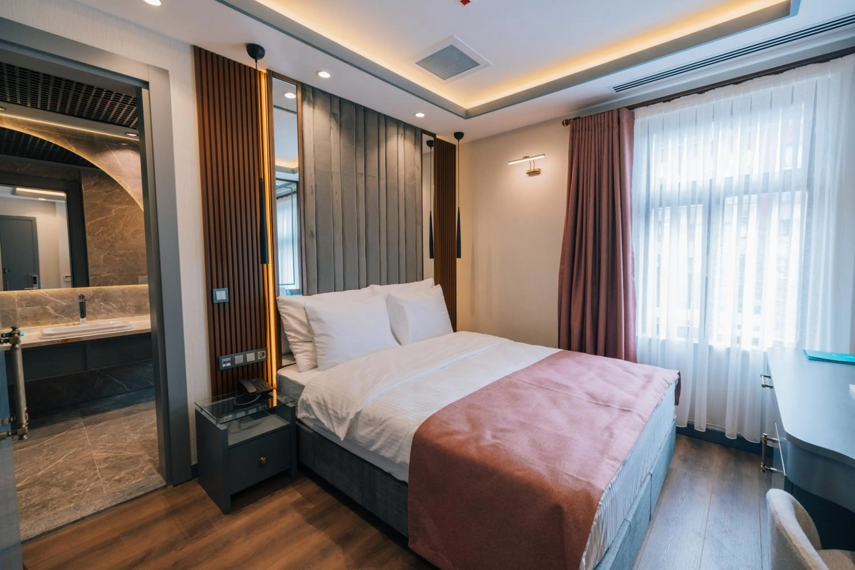 Bed in VE Hotels Adakale