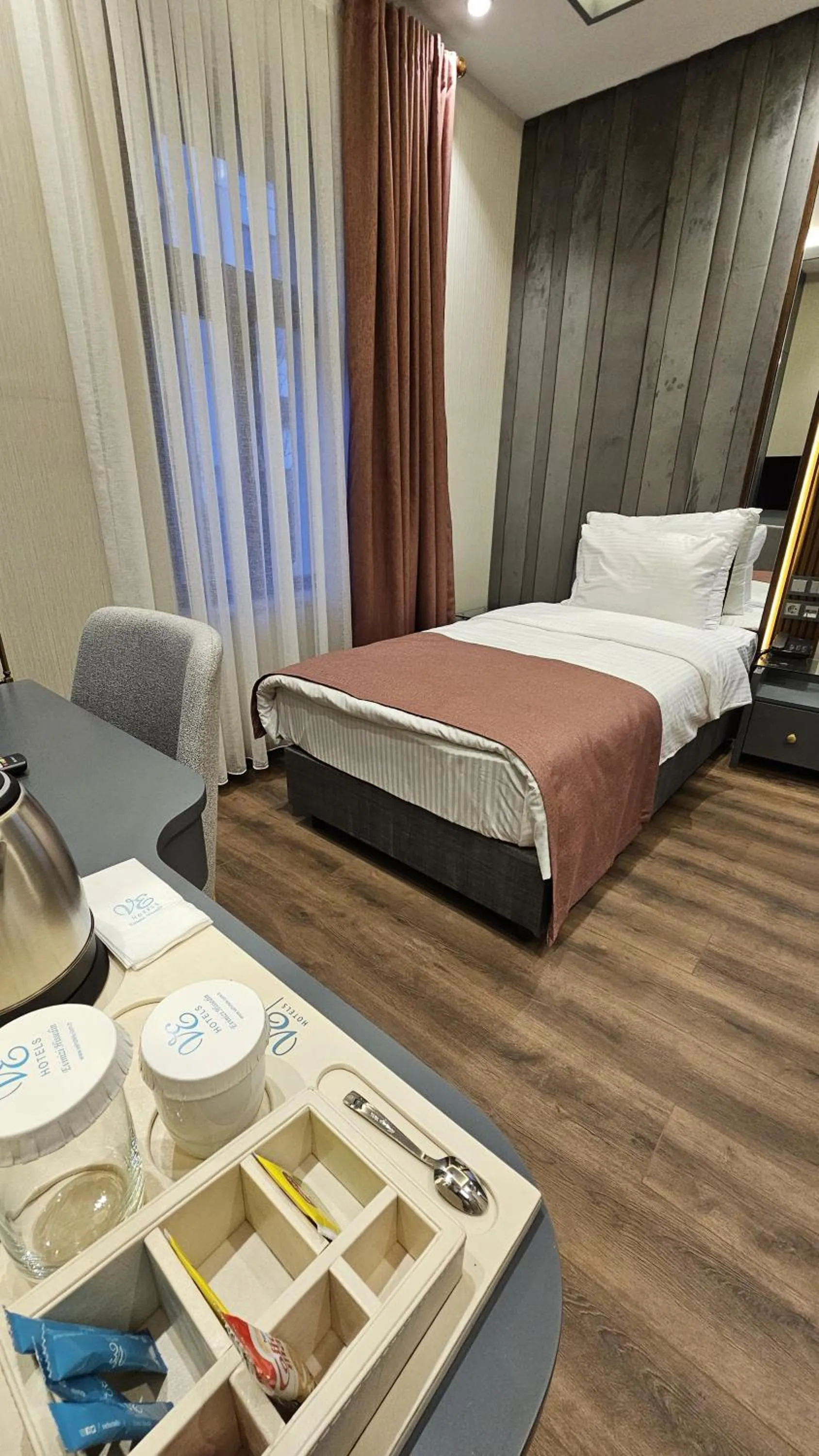 Bed in VE Hotels Adakale