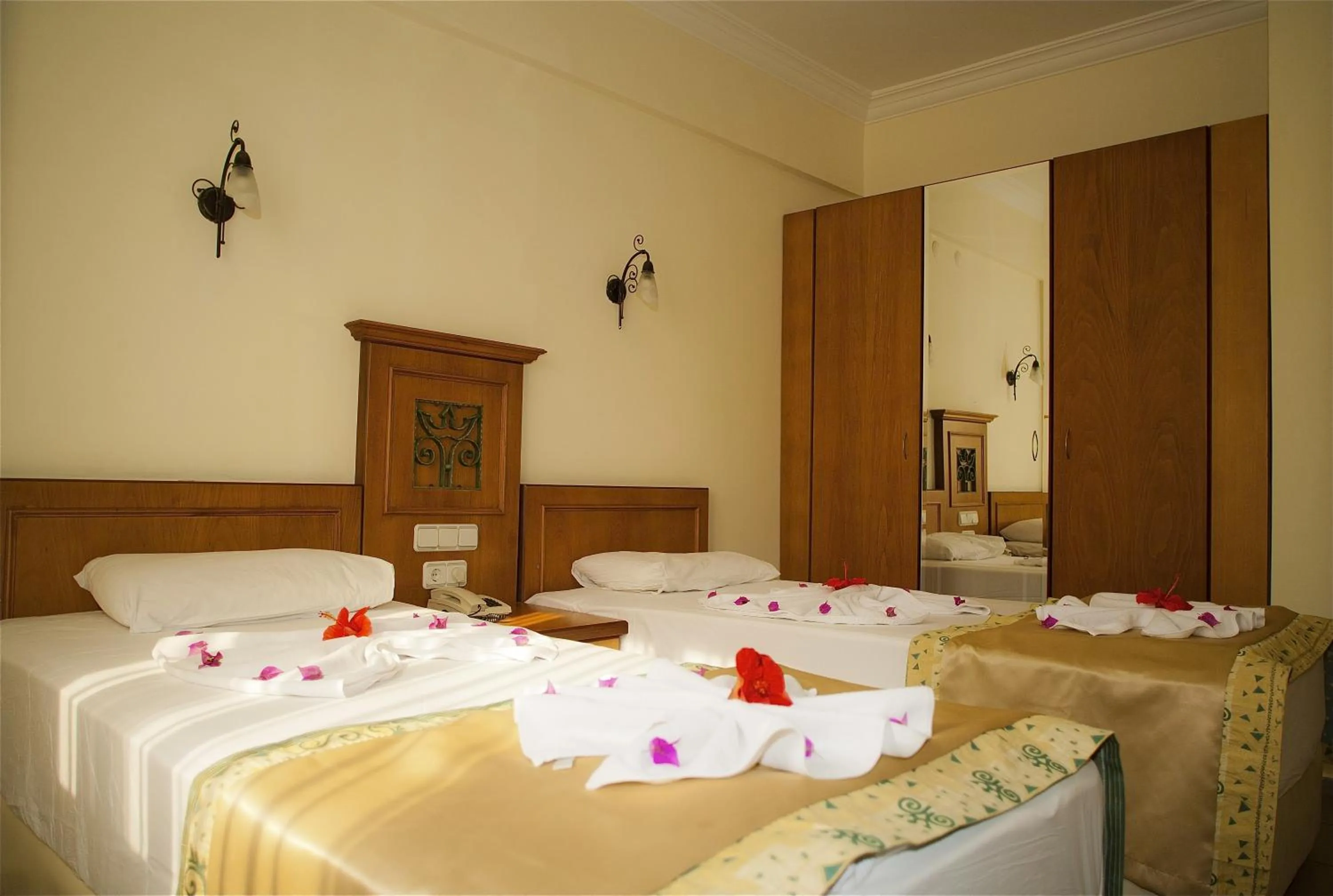 Bed in Aegean Princess Apartments And Studio