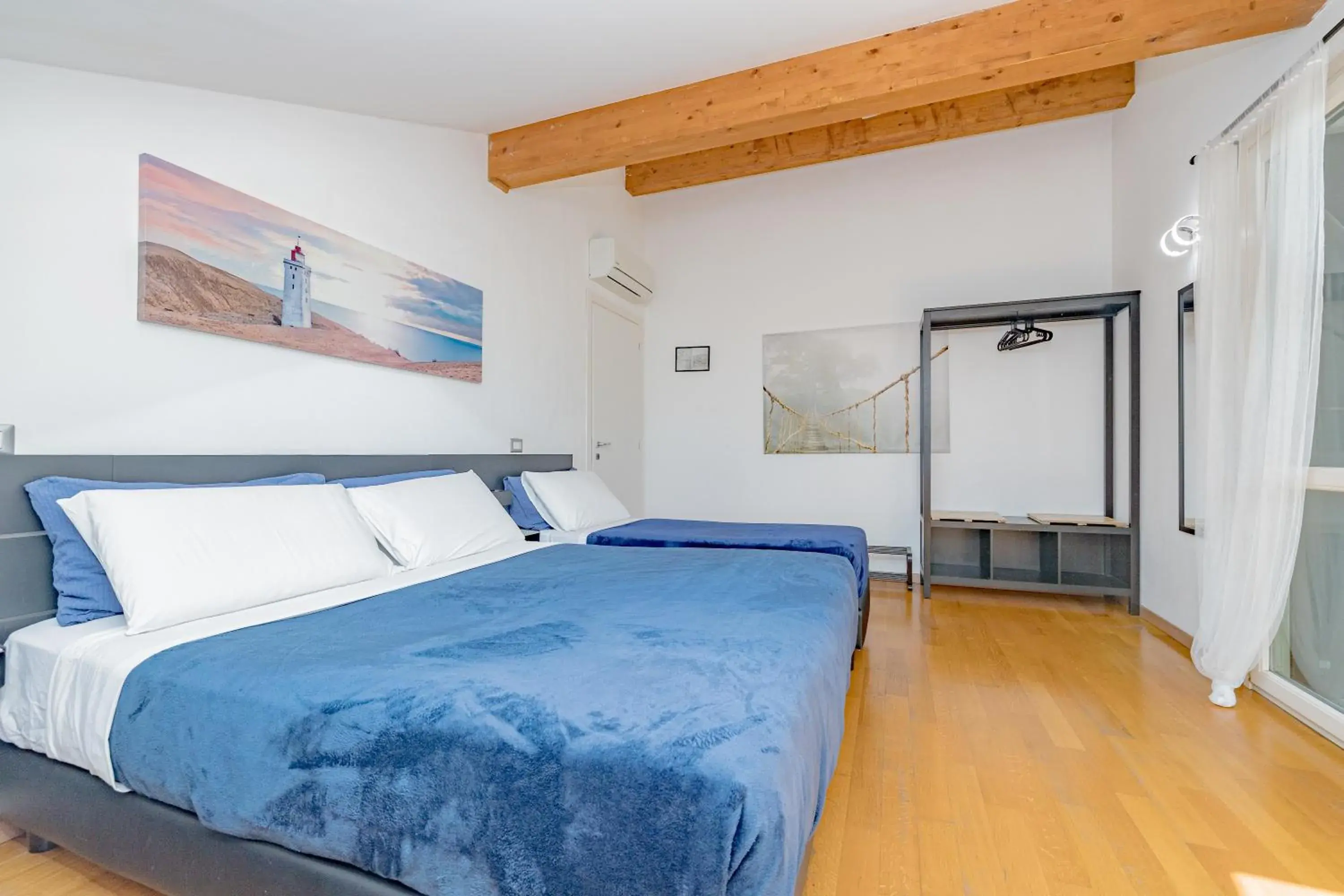 Comfort Quadruple Room in B&B Villa Milano by Rhospitality it Comfort Quadruple Room in B&B Villa Milano by Rhospitality it