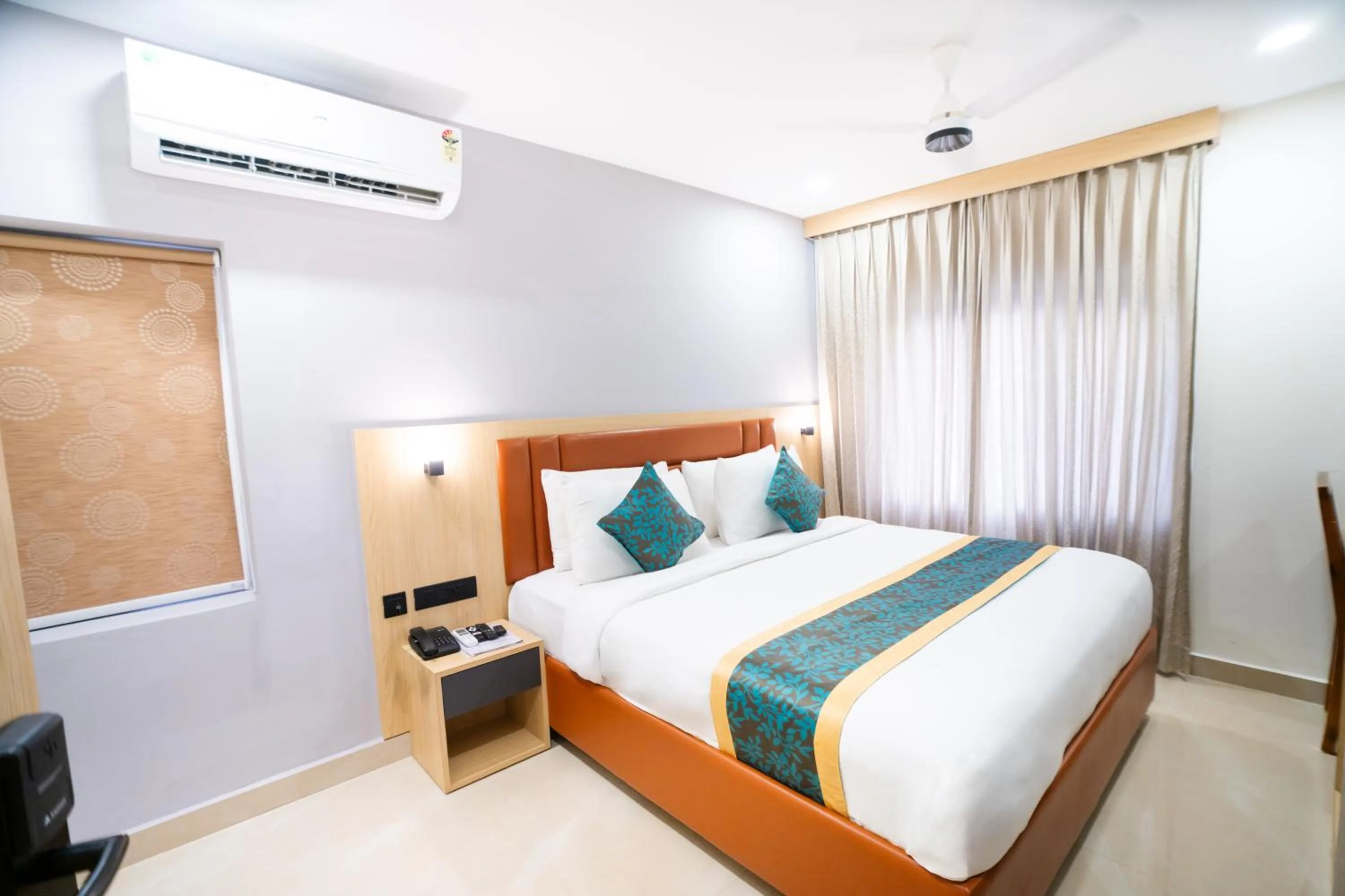 Photo of the whole room, Bed in Sunrise Business Hotel, S R Nagar - Ameerpet